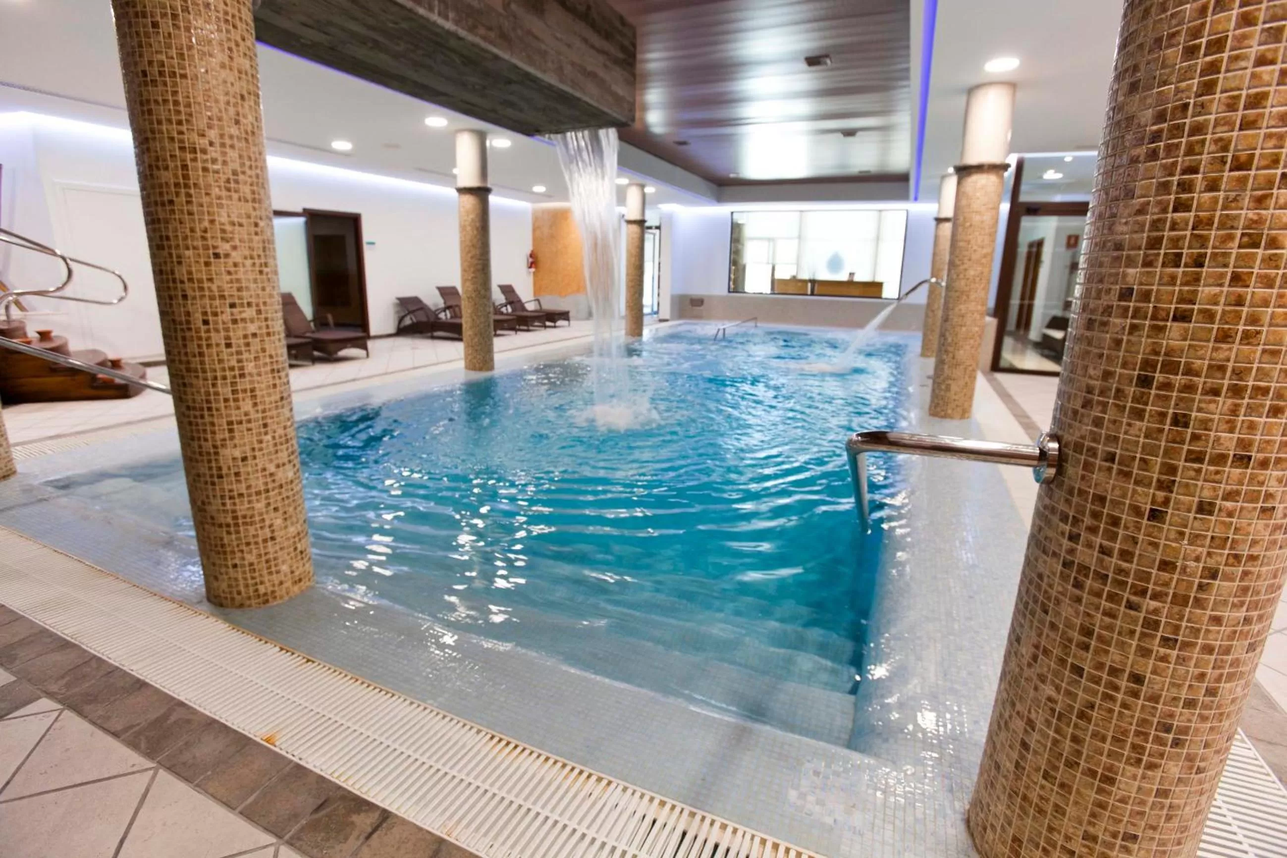 Swimming pool in Hospes Palacio de Arenales & Spa