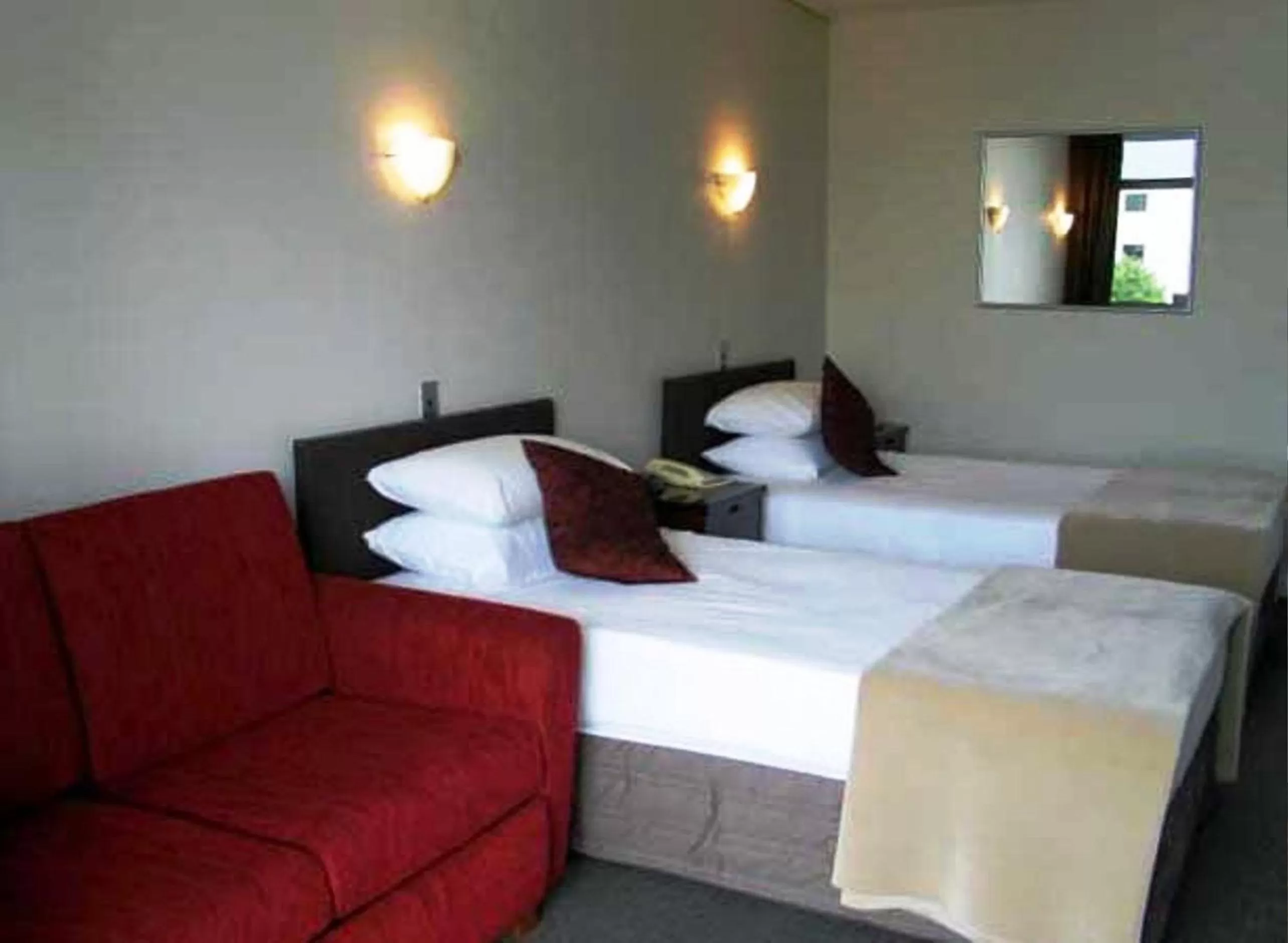 Bed in City Central Motel Apartments