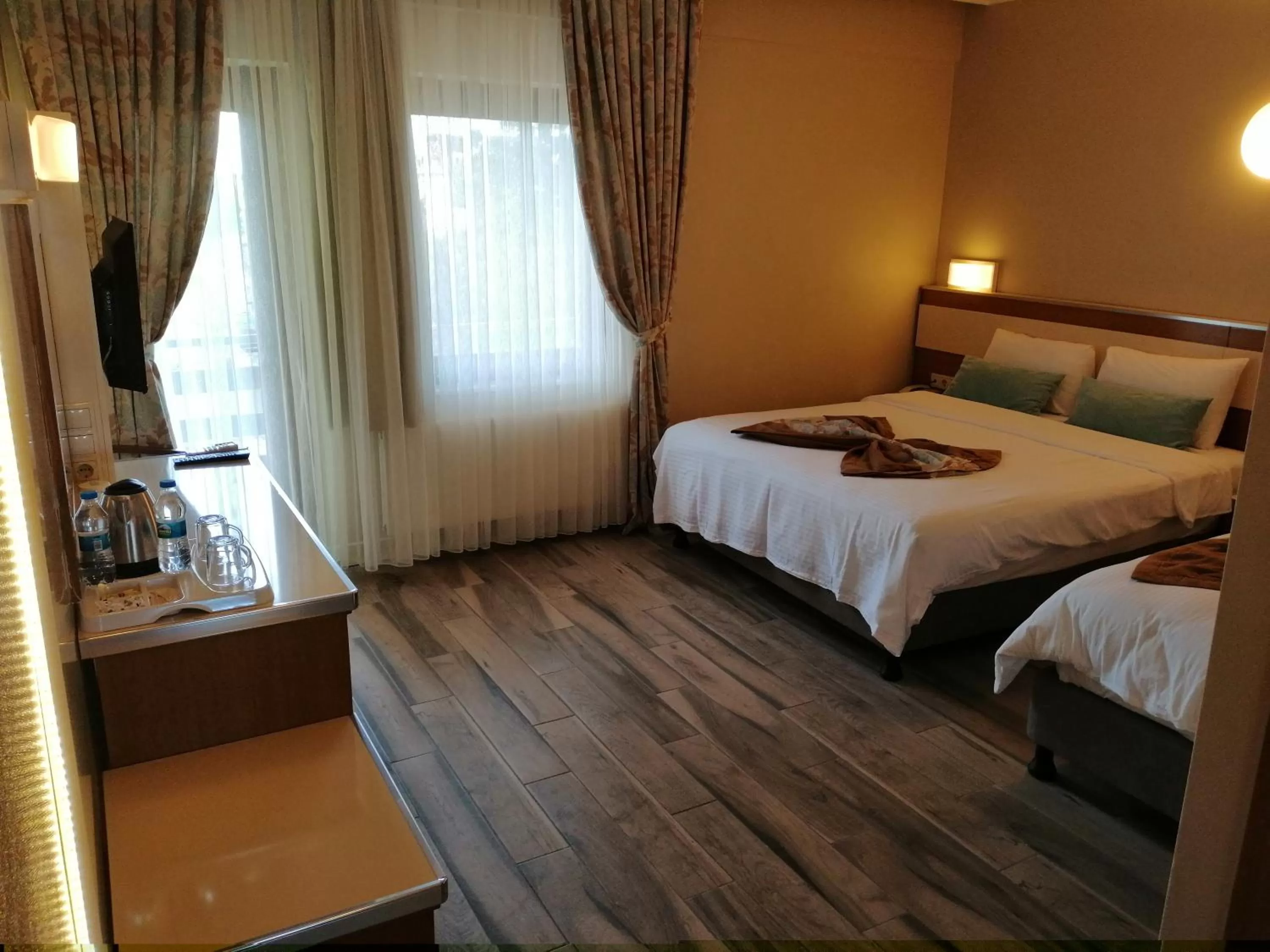 Photo of the whole room, Bed in Iris Hotel & Spa