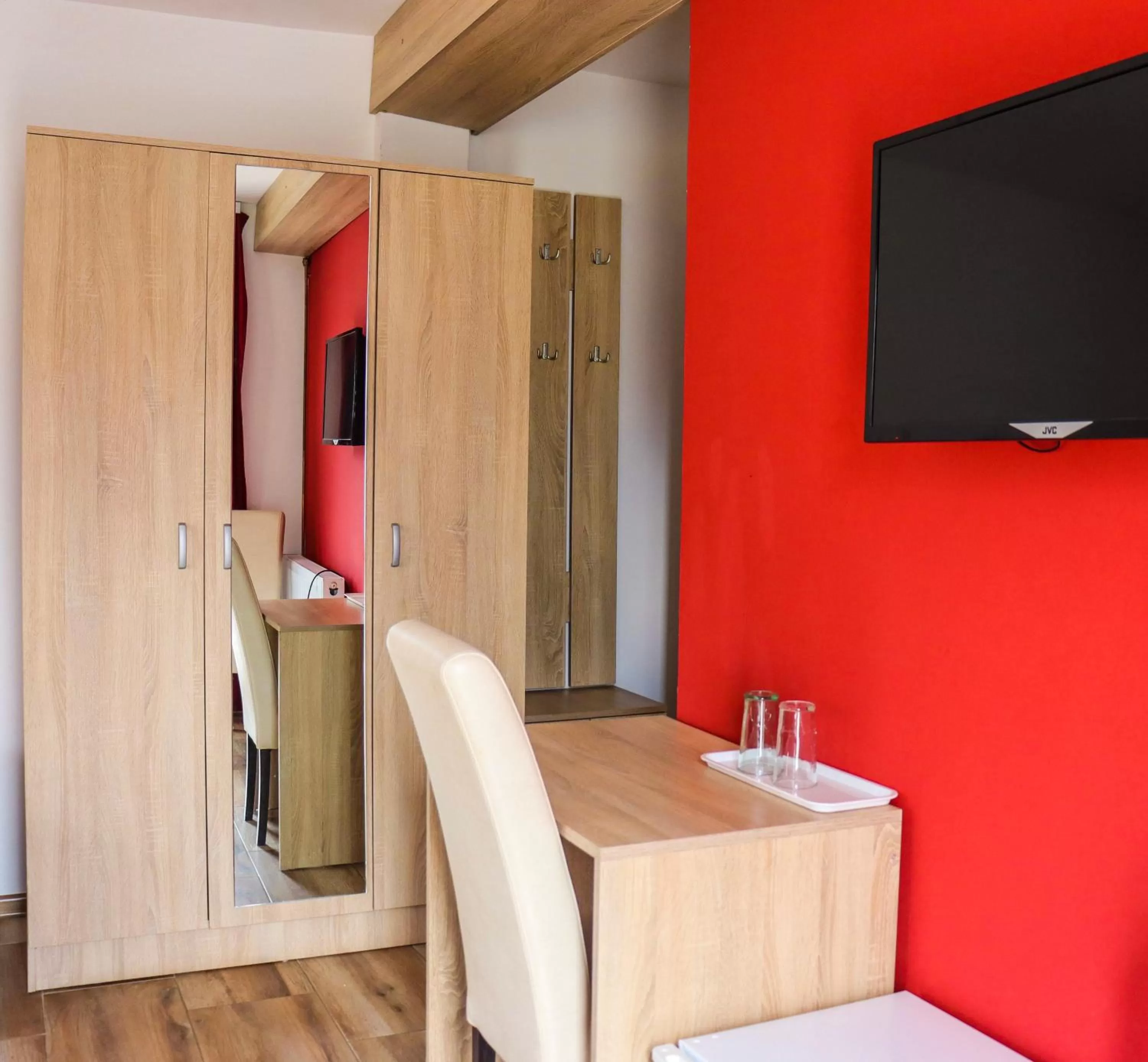 Communal lounge/ TV room, TV/Entertainment Center in Restoran & Motel Manjež