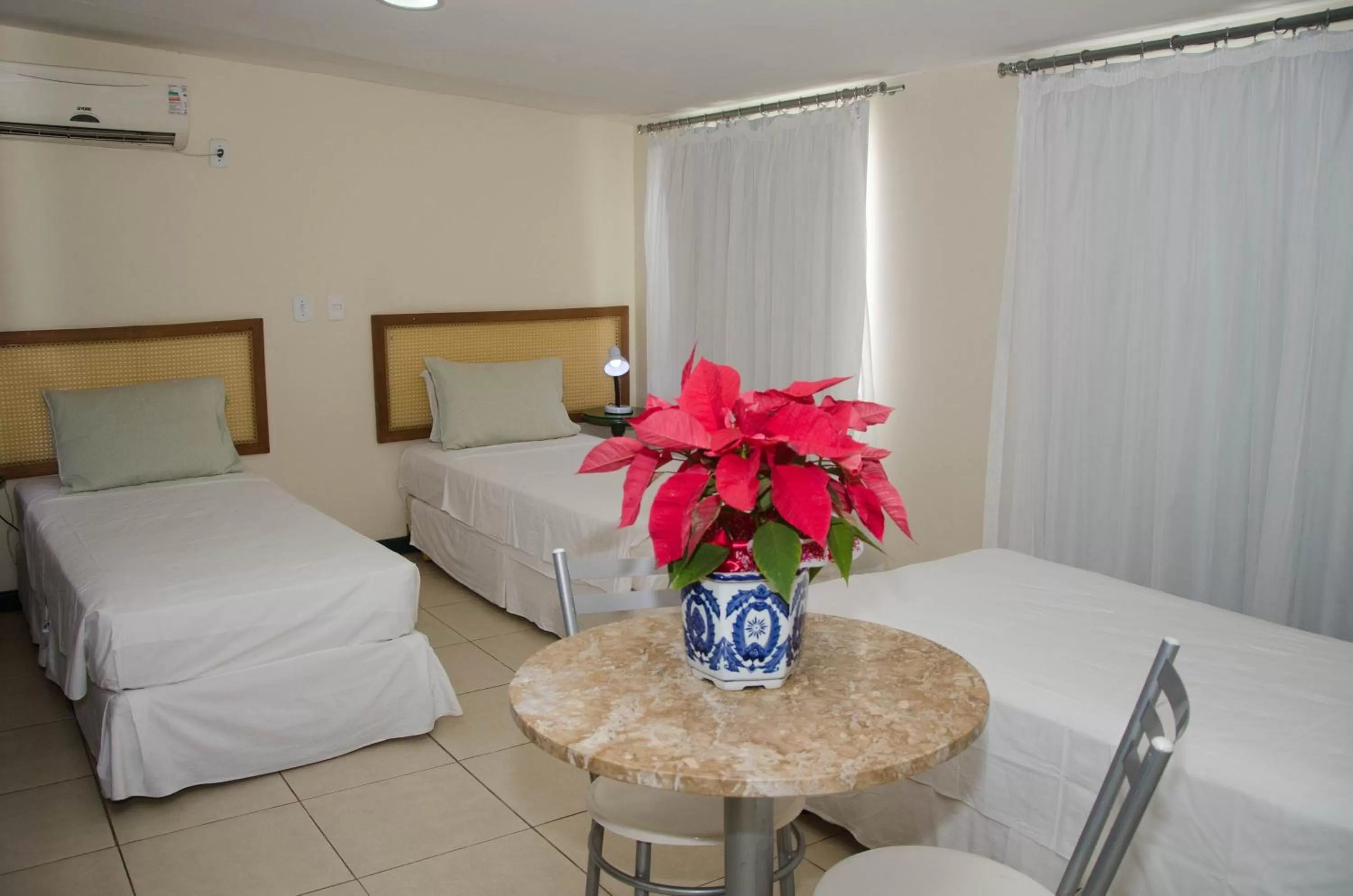 Bed in Pousada Colonial Chile