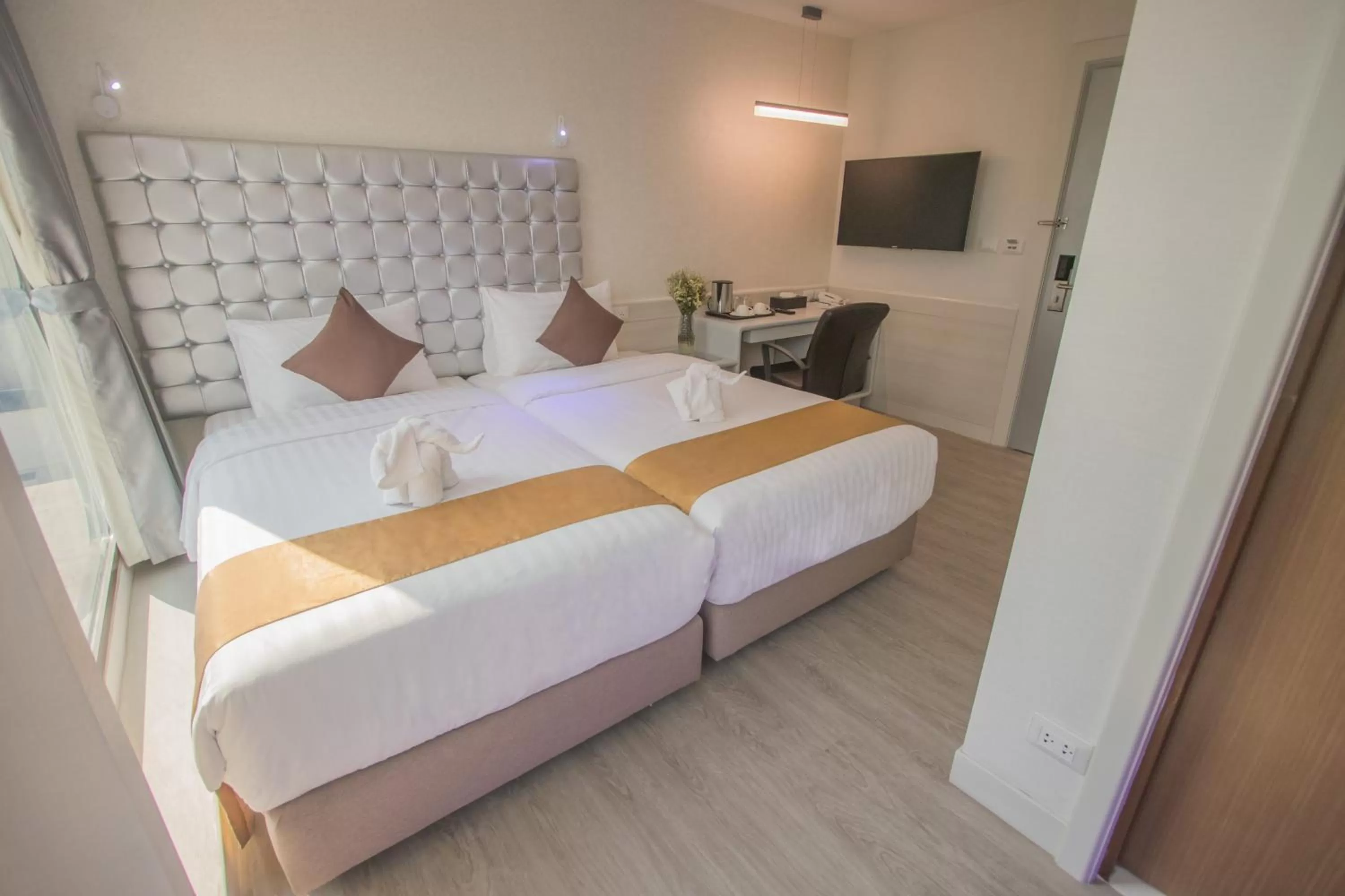 Bed in Justice Hotel