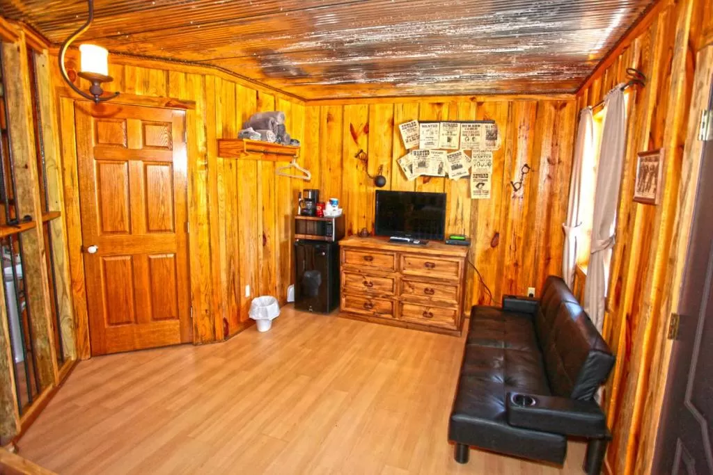 Seating area, TV/Entertainment Center in Diamonds Old West