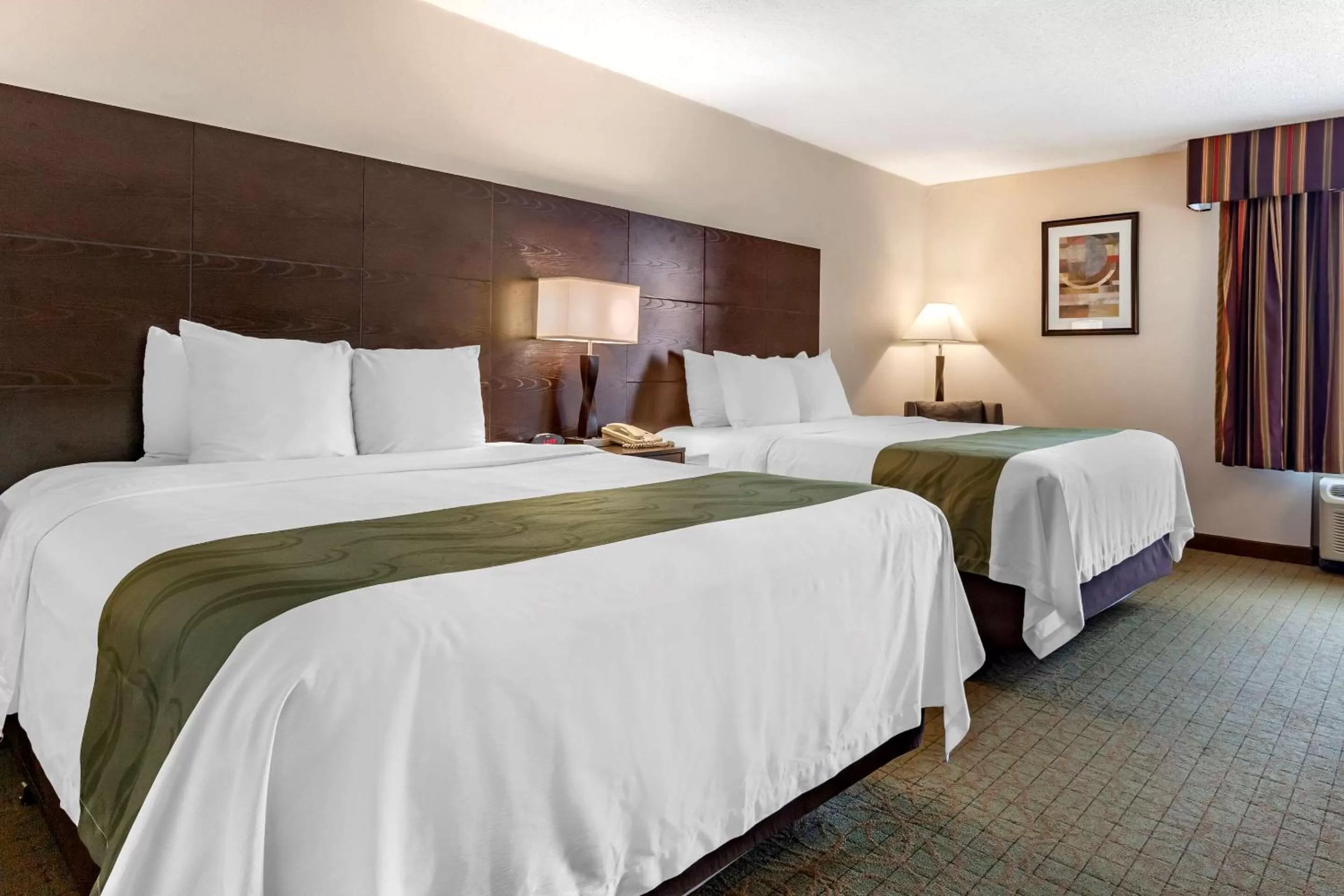 Photo of the whole room, Bed in Quality Inn & Suites Escanaba North