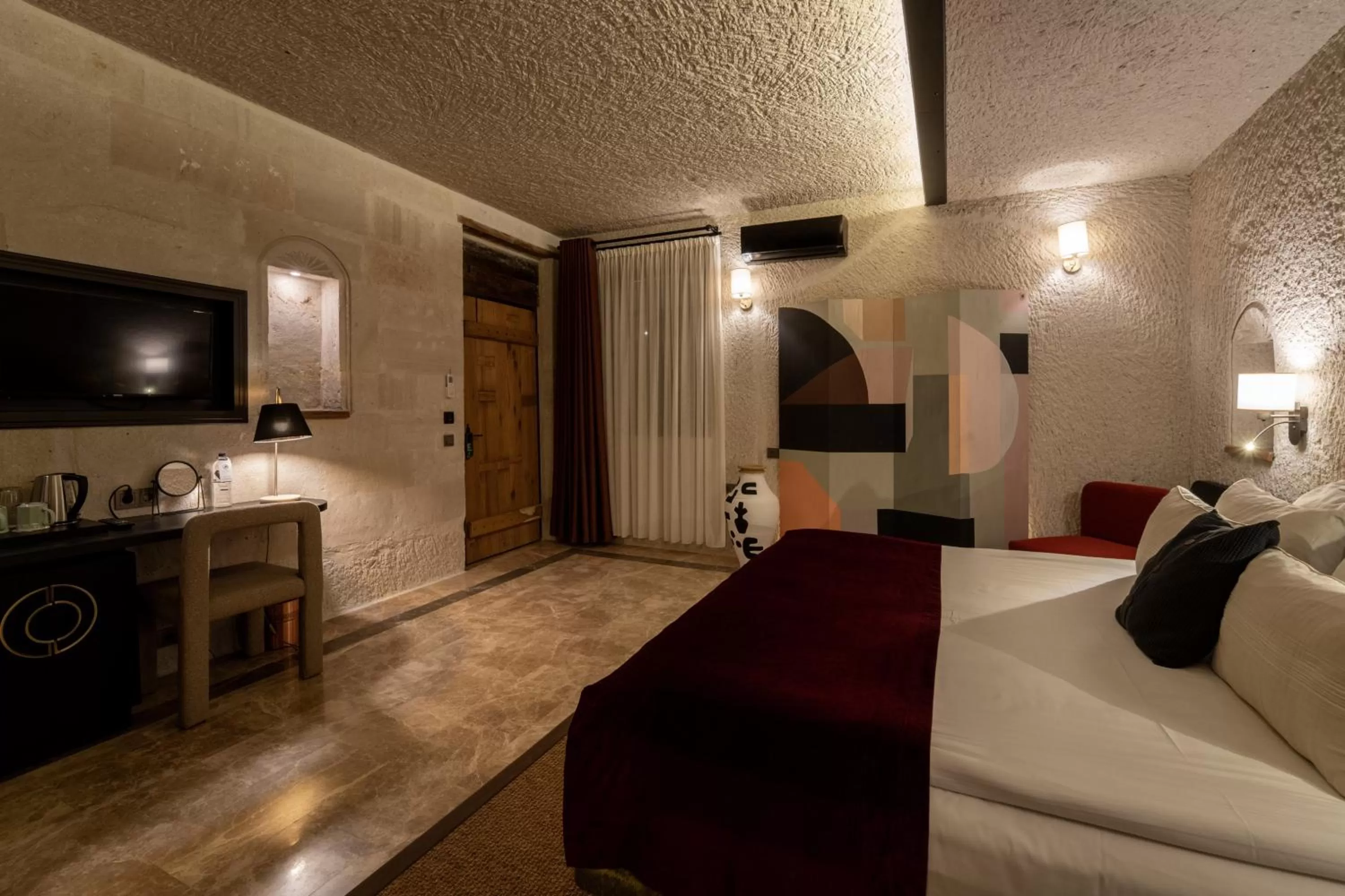Bedroom in Artemis Cave Suites & Spa- Adults Only