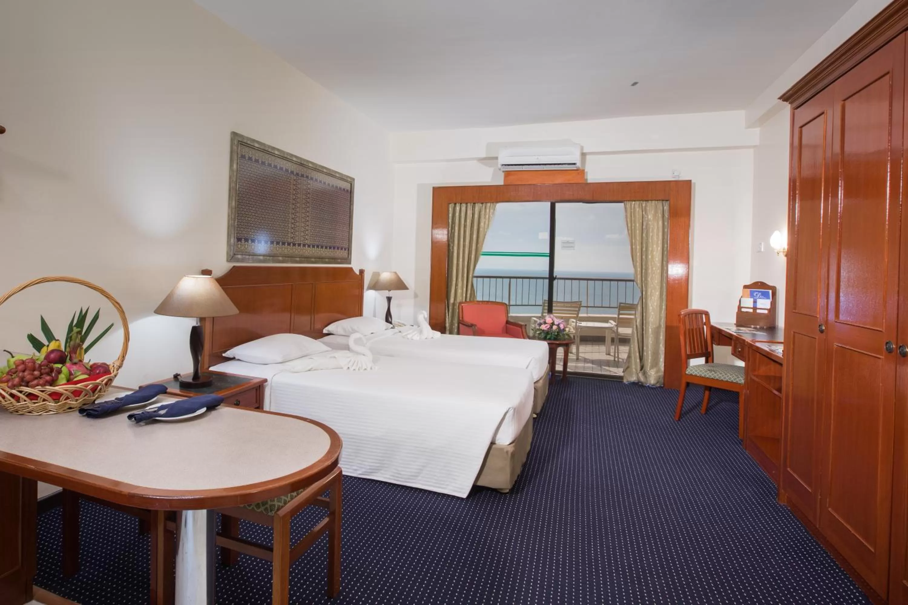 Bedroom in Rainbow Paradise Beach Resort