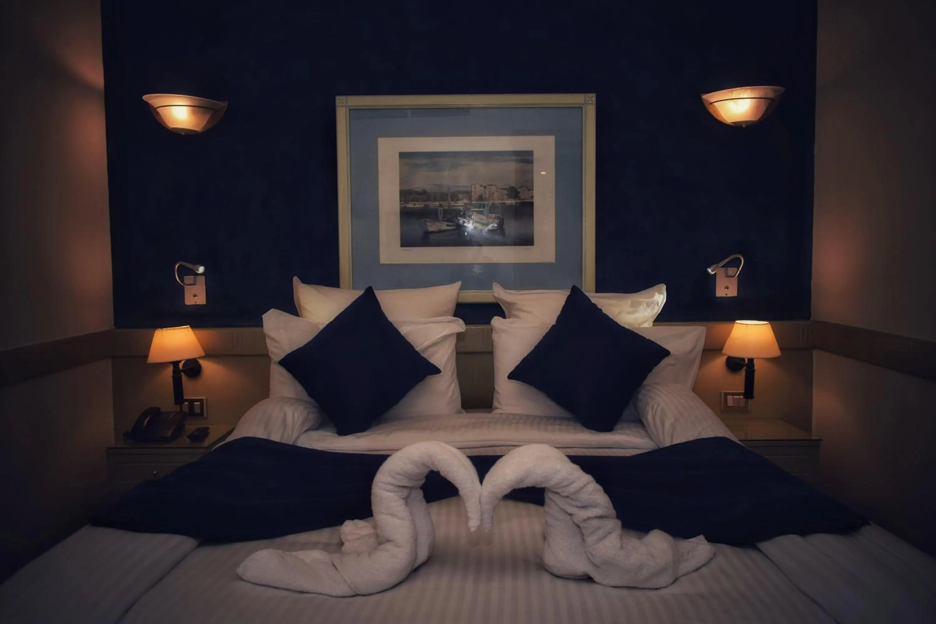 Bed in Romance Alexandria Hotel