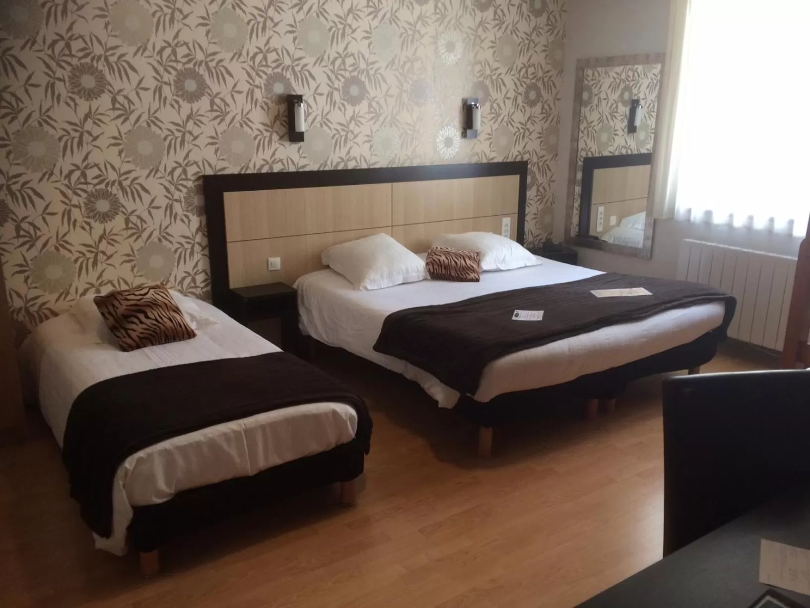 Bed in Hôtel Le Bayeux