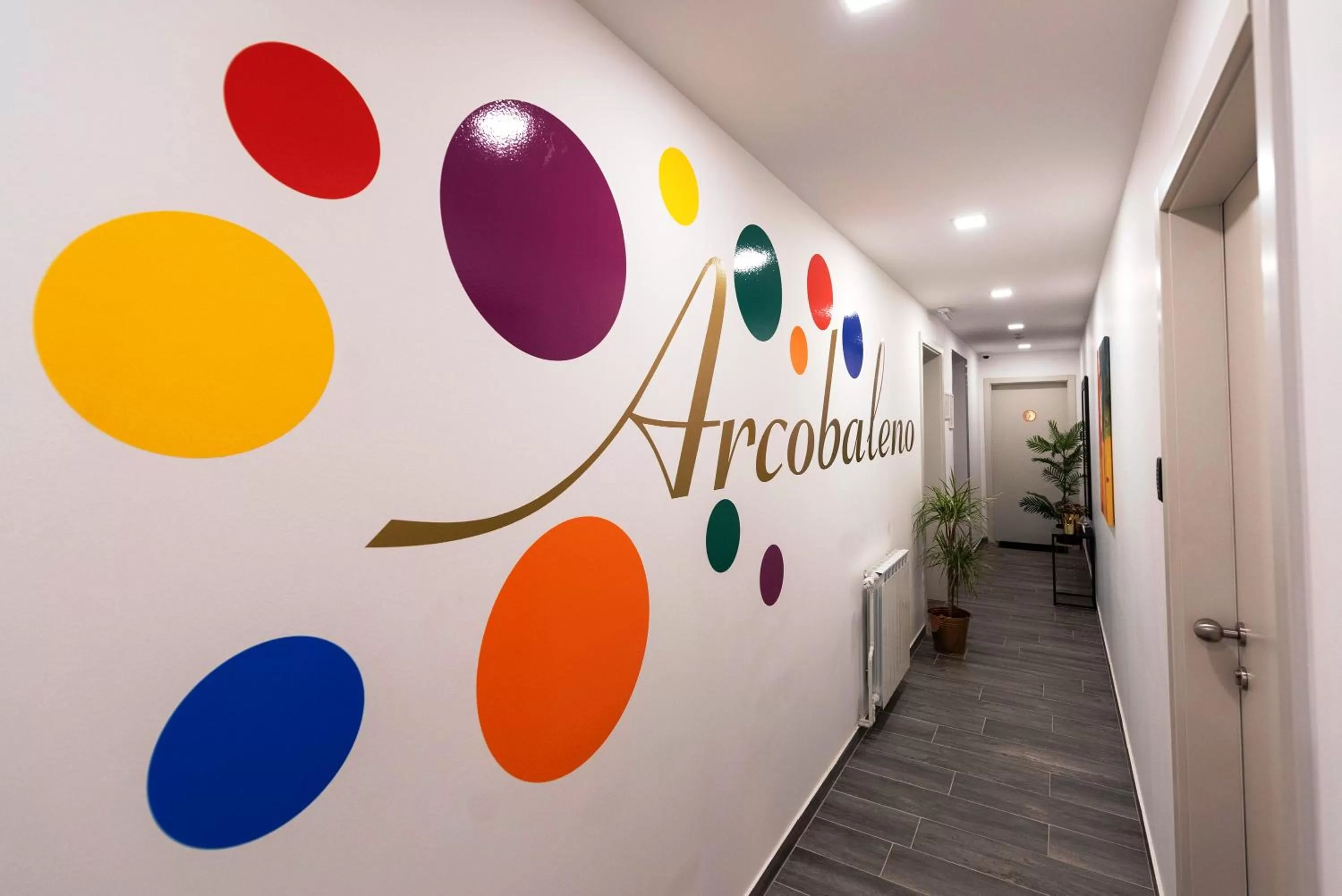 Logo/Certificate/Sign in Arcobaleno Apartments & Rooms