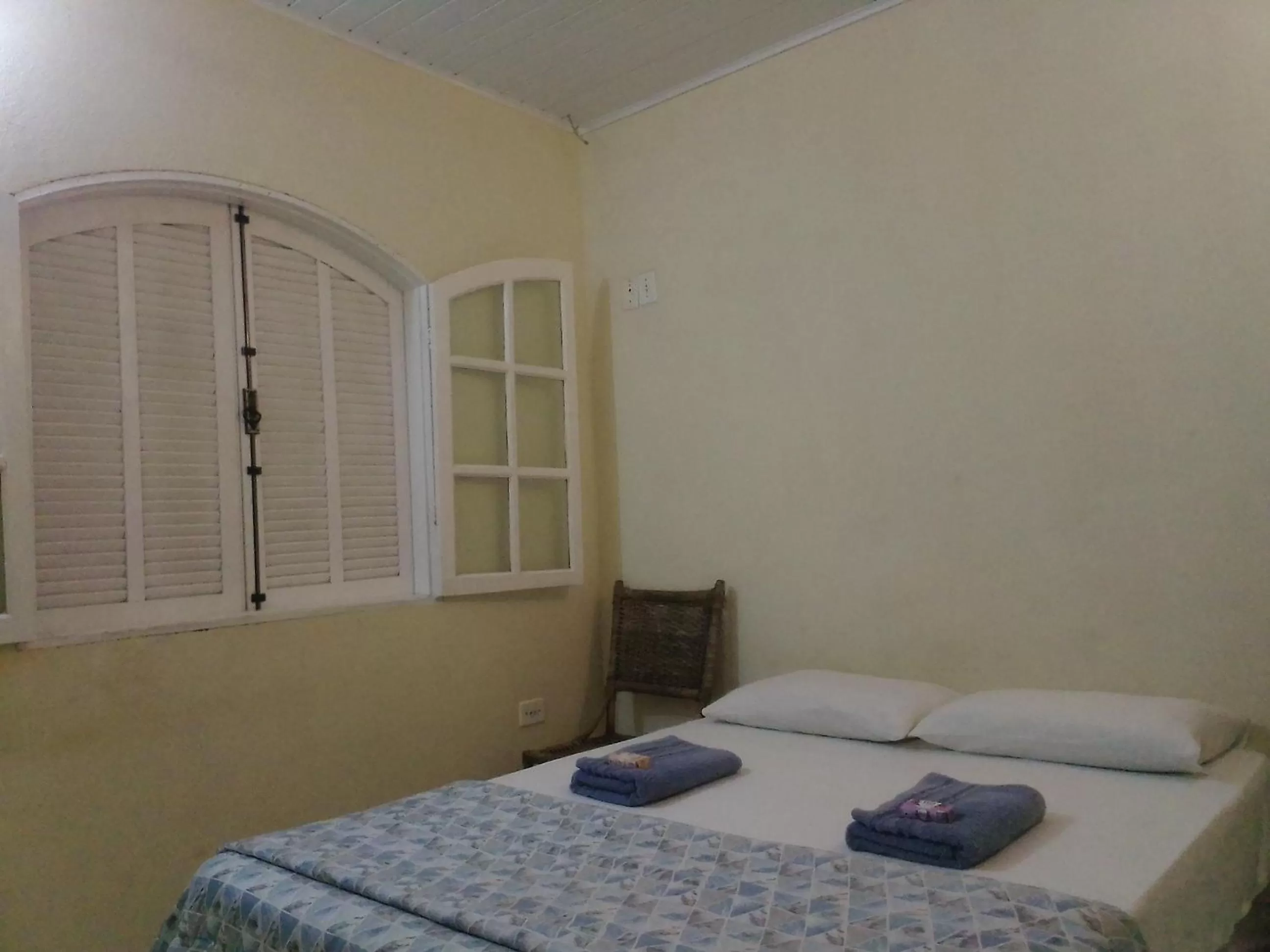 Bed in Hospedagem Pousada Fantasia Paraty