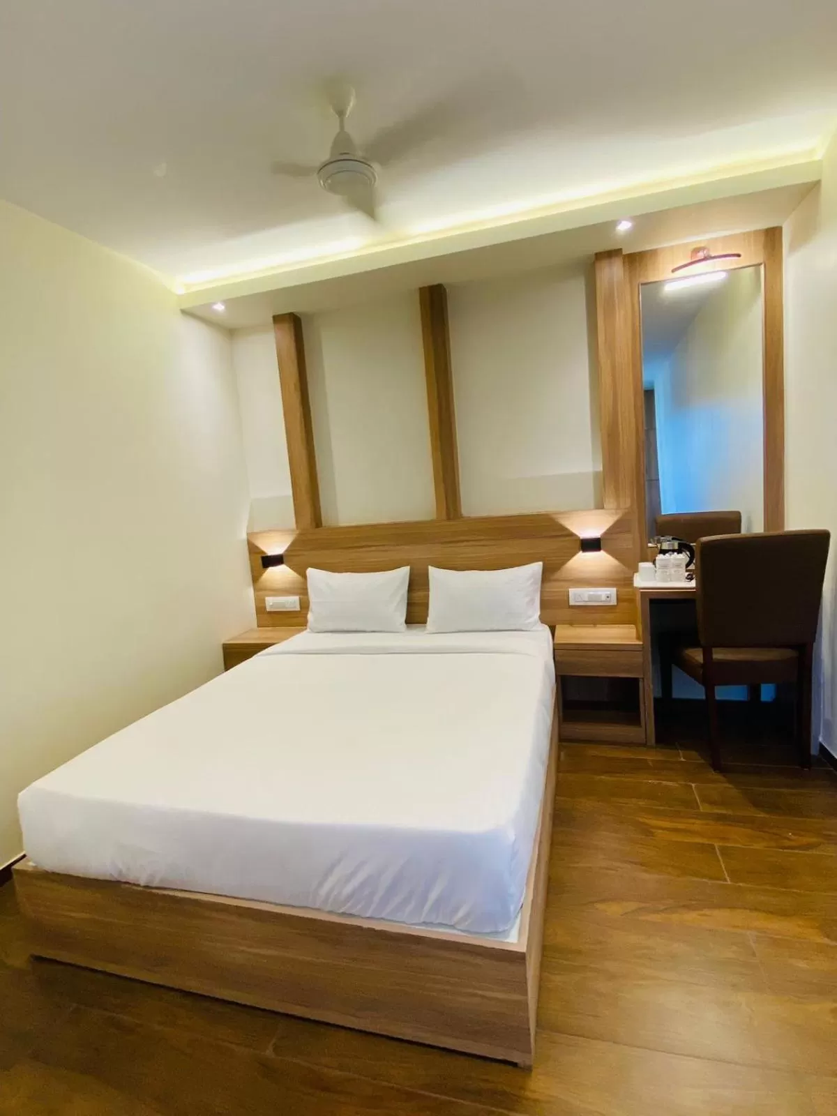 Bed in Hotel Plaza Heights by RAK Rooms, Mangaluru