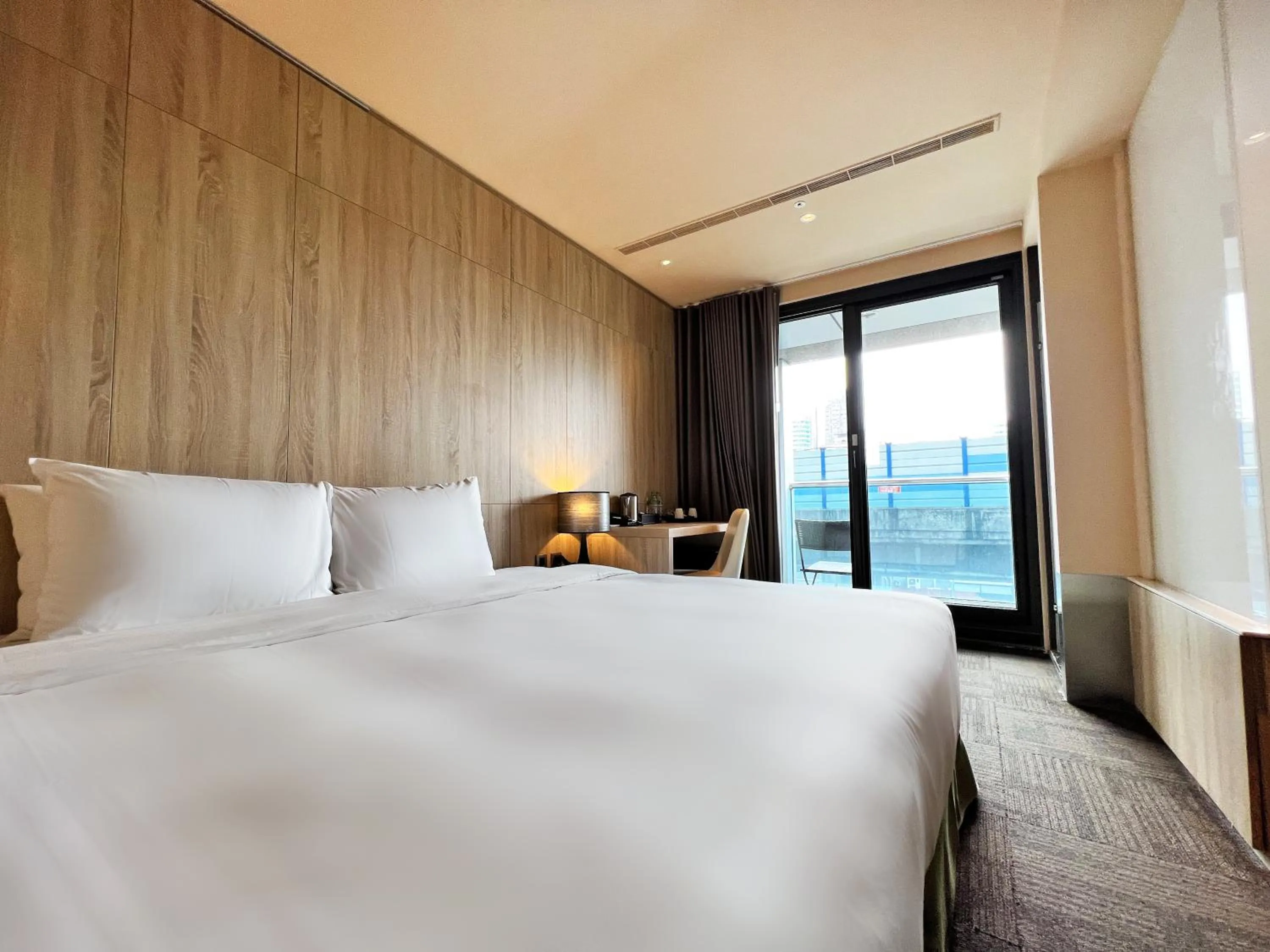 Bedroom in Wallsun Hotel