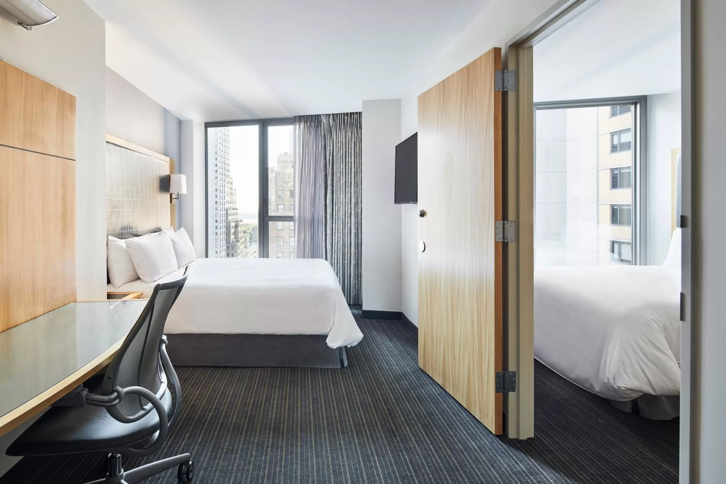 Bed in Club Quarters Hotel World Trade Center, New York