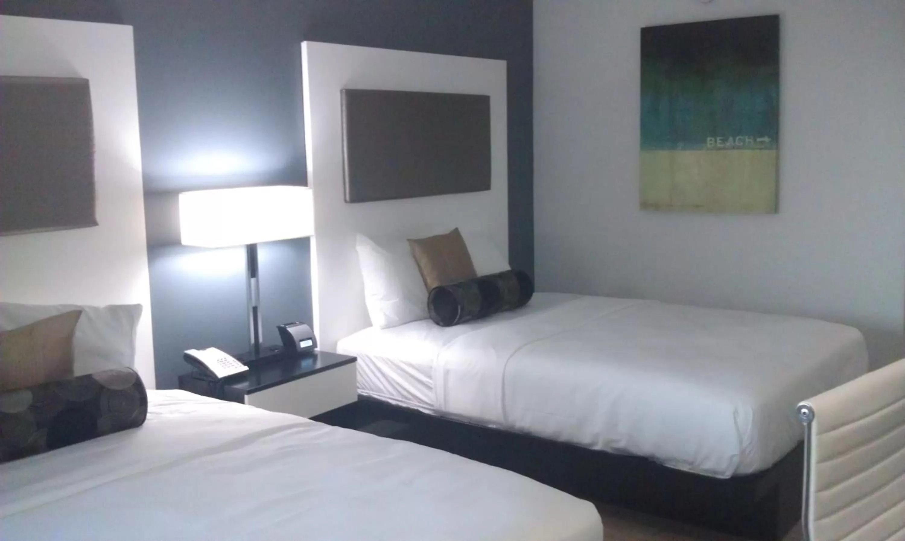 Bed in Lotus Boutique Inn and Suites