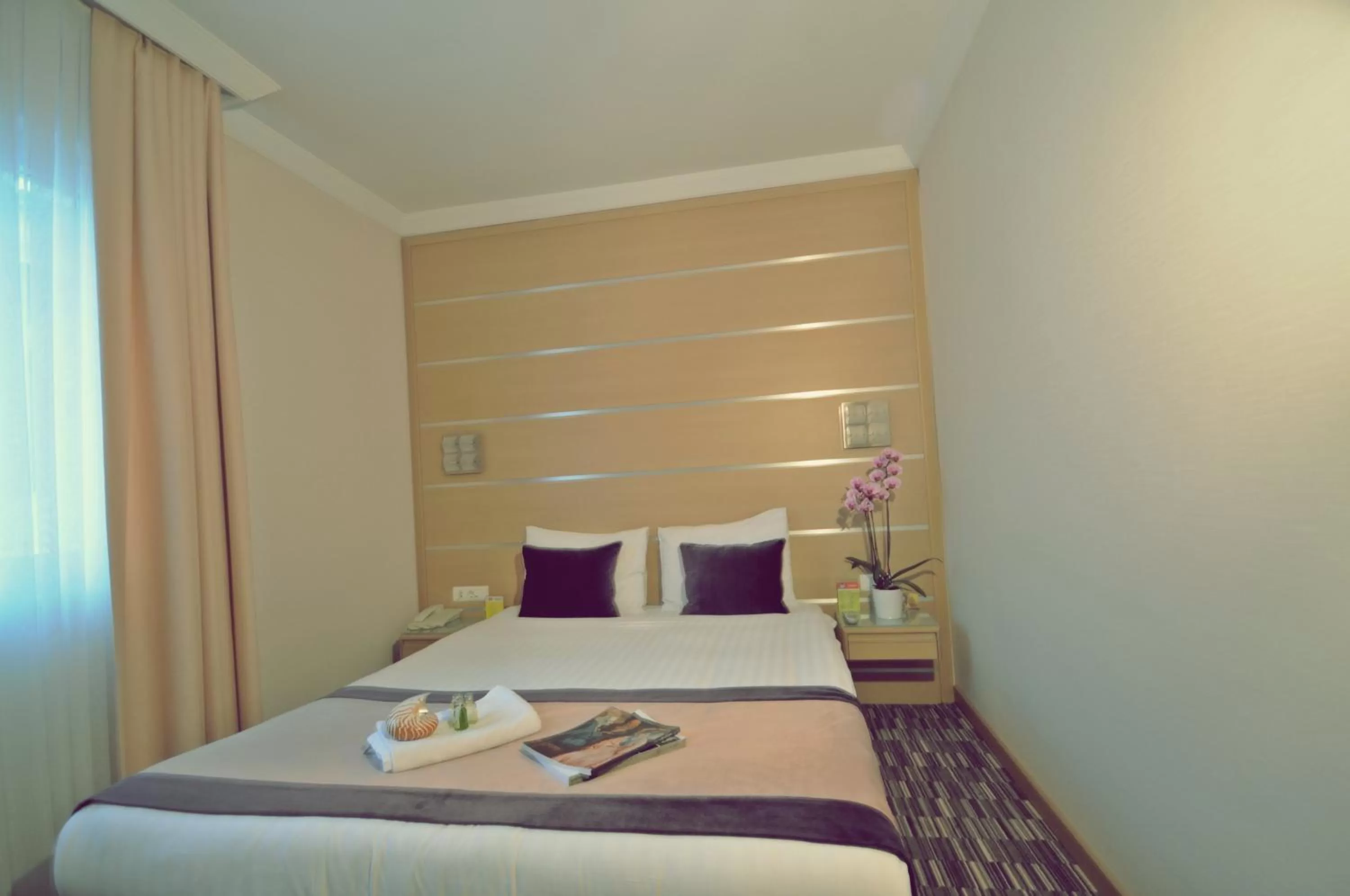 Bed in SV Business Hotel Taksim