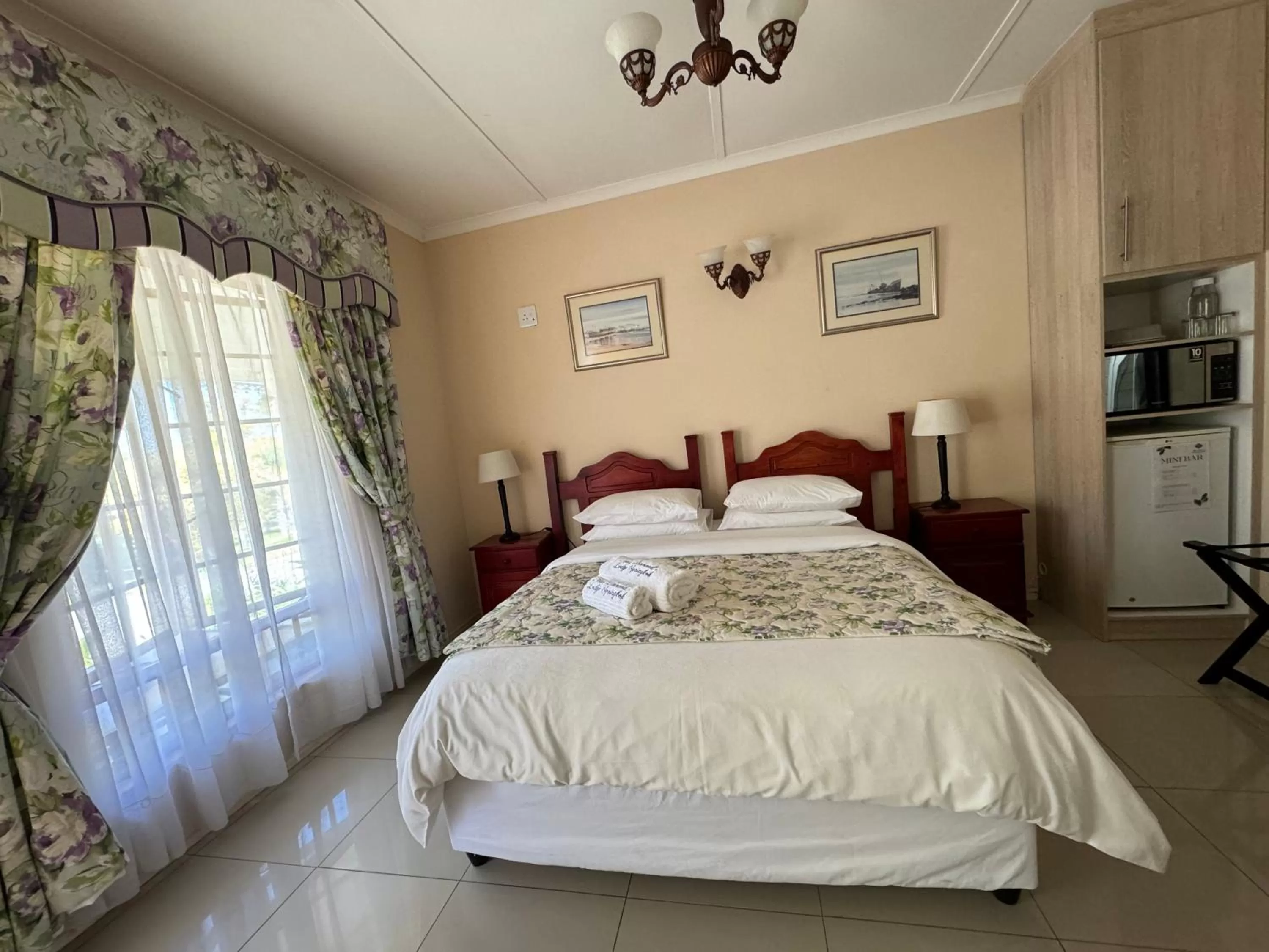 Bed in Blue Diamond Lodge & Spa