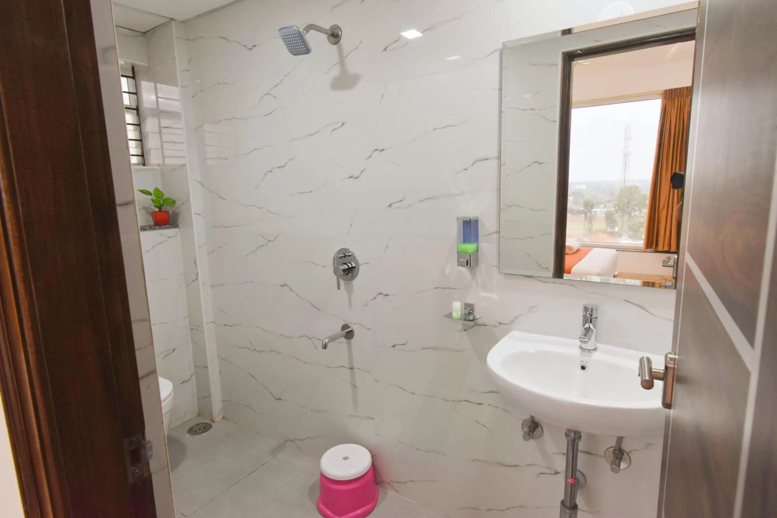 Bathroom in Keerthis Royal Suites - Hotel Near Kempegowda International Airport
