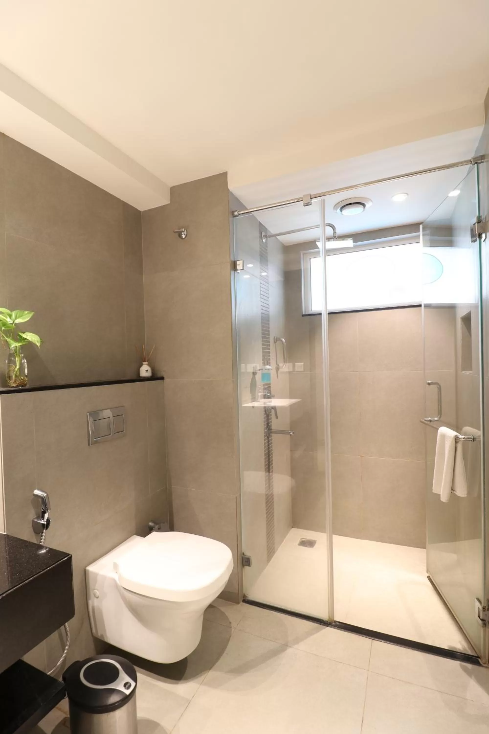 Shower in ZIBE Salem By GRT Hotels