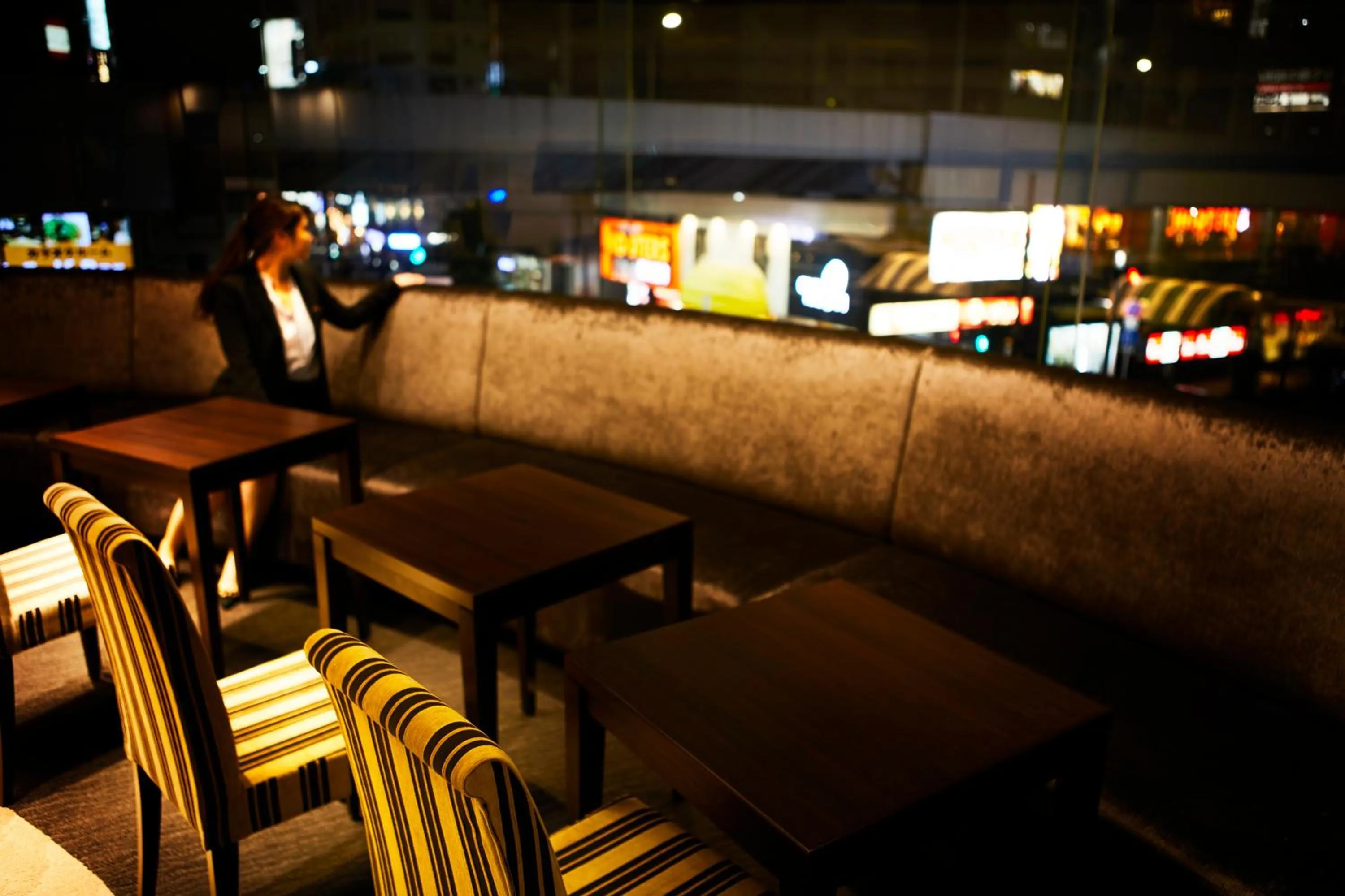 Communal lounge/ TV room in Ginza Grand Hotel