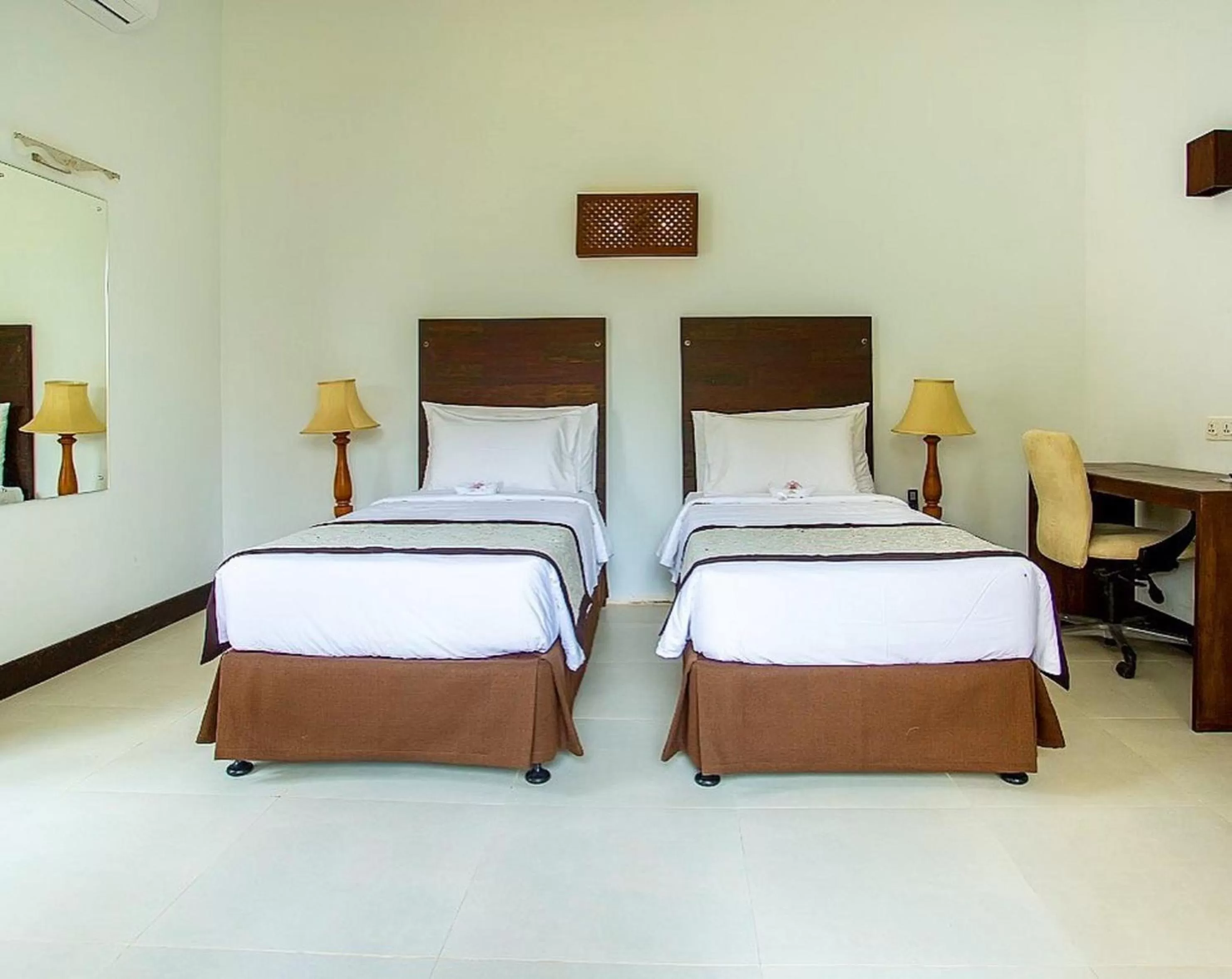 Bed in Amaluna Resorts