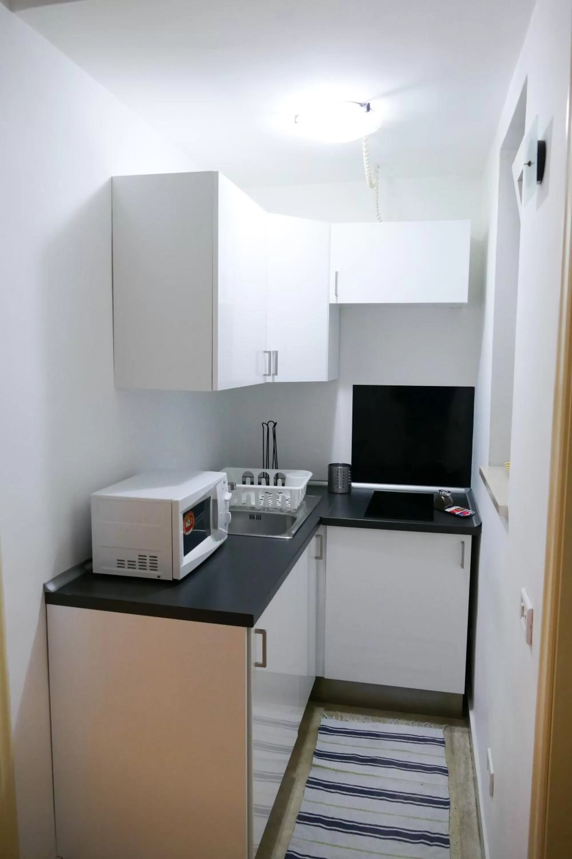 Kitchen or kitchenette in Visa Residence