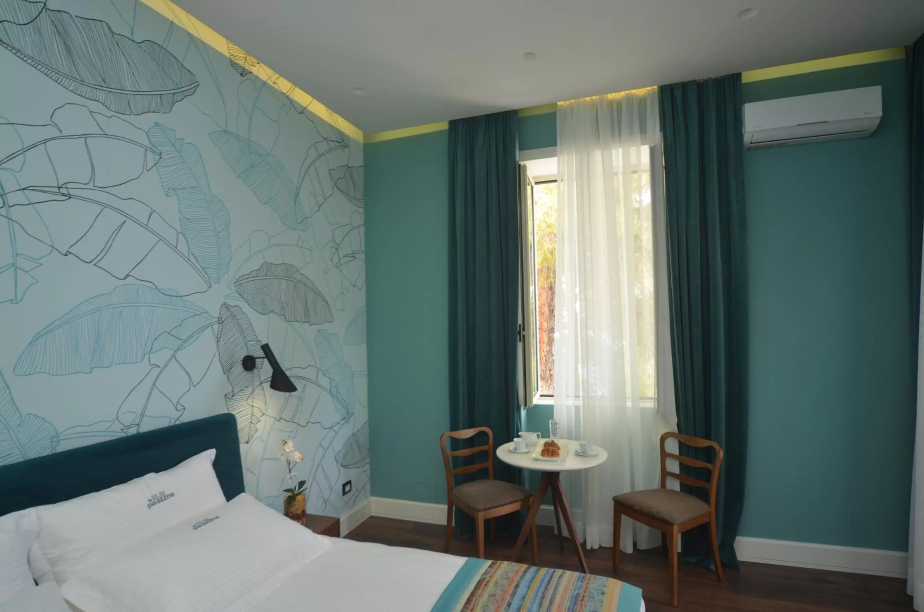 Bedroom in Le Palazzine Hotel