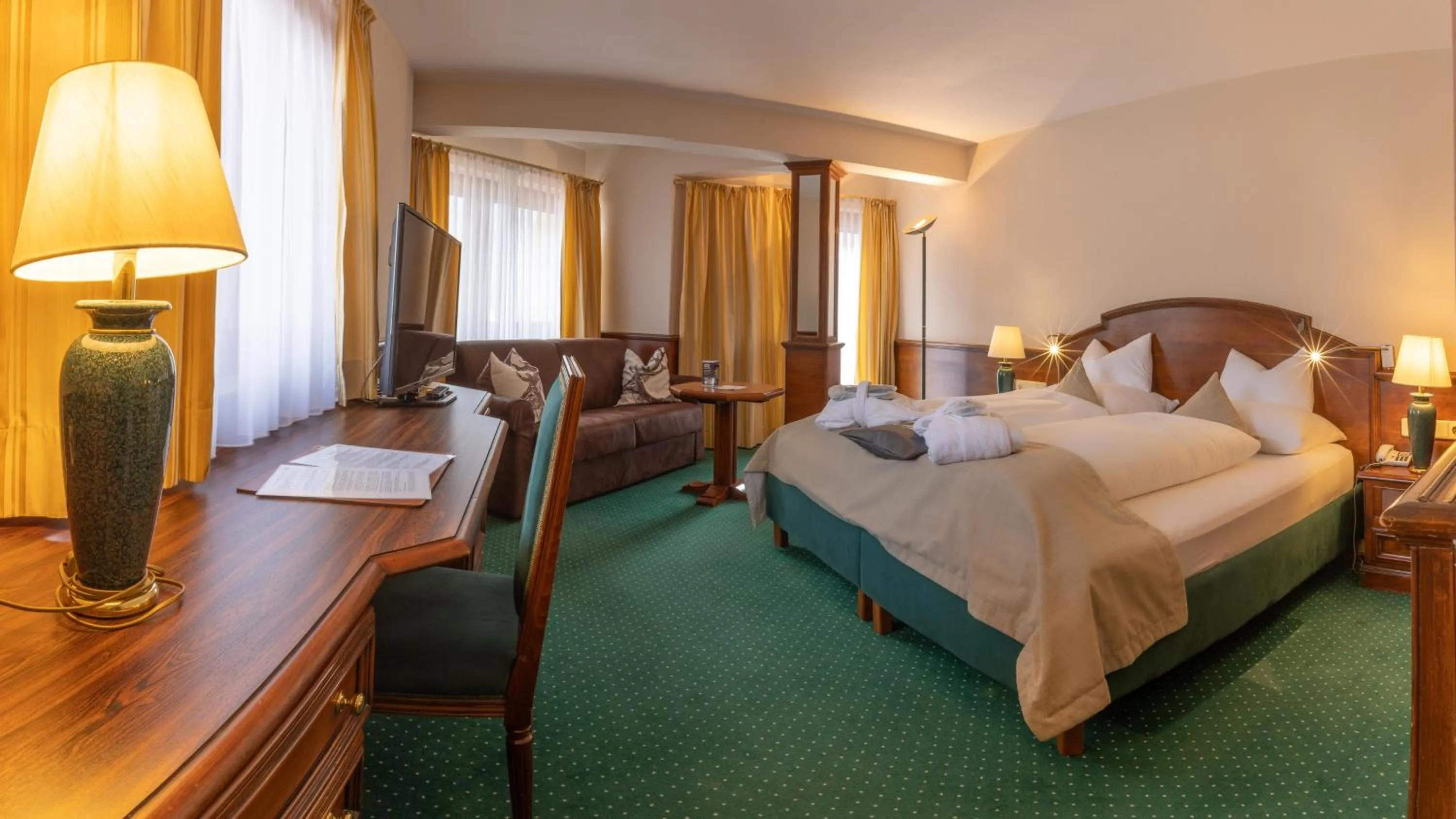 Bed in MANNI das Hotel