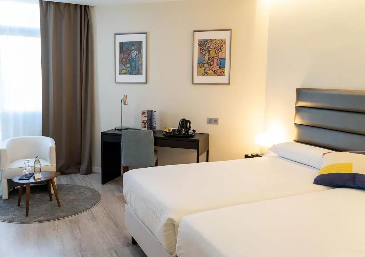 Bed in Hotel Pasarela