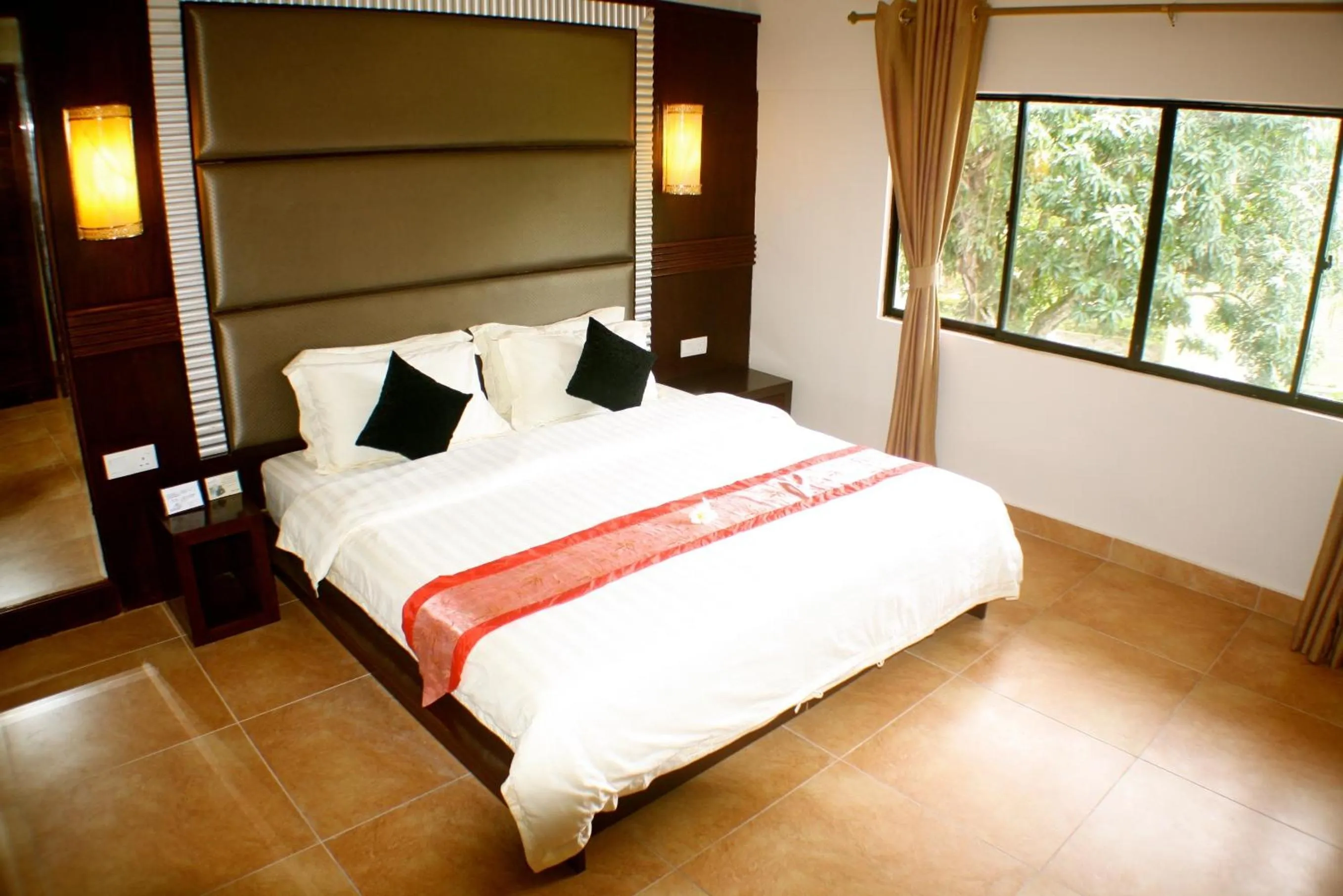 Bed in Beringgis Beach Resort & Spa