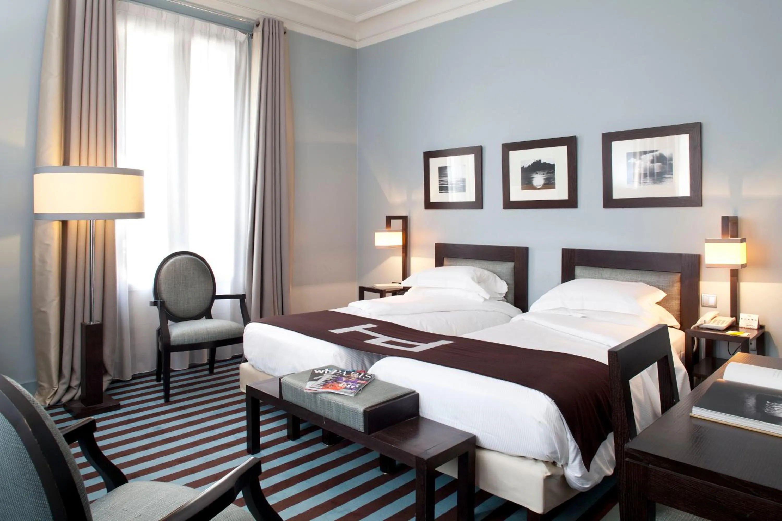 Photo of the whole room, Bed in Hotel Duret Paris Champs Elysées