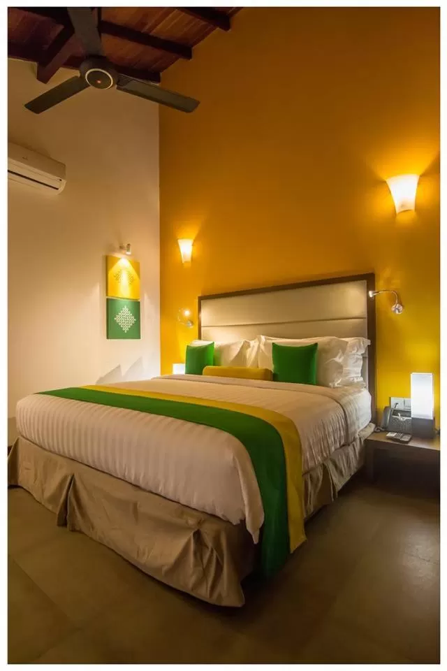 Bed in The Thinnai - All-Suites Boutique Hotel