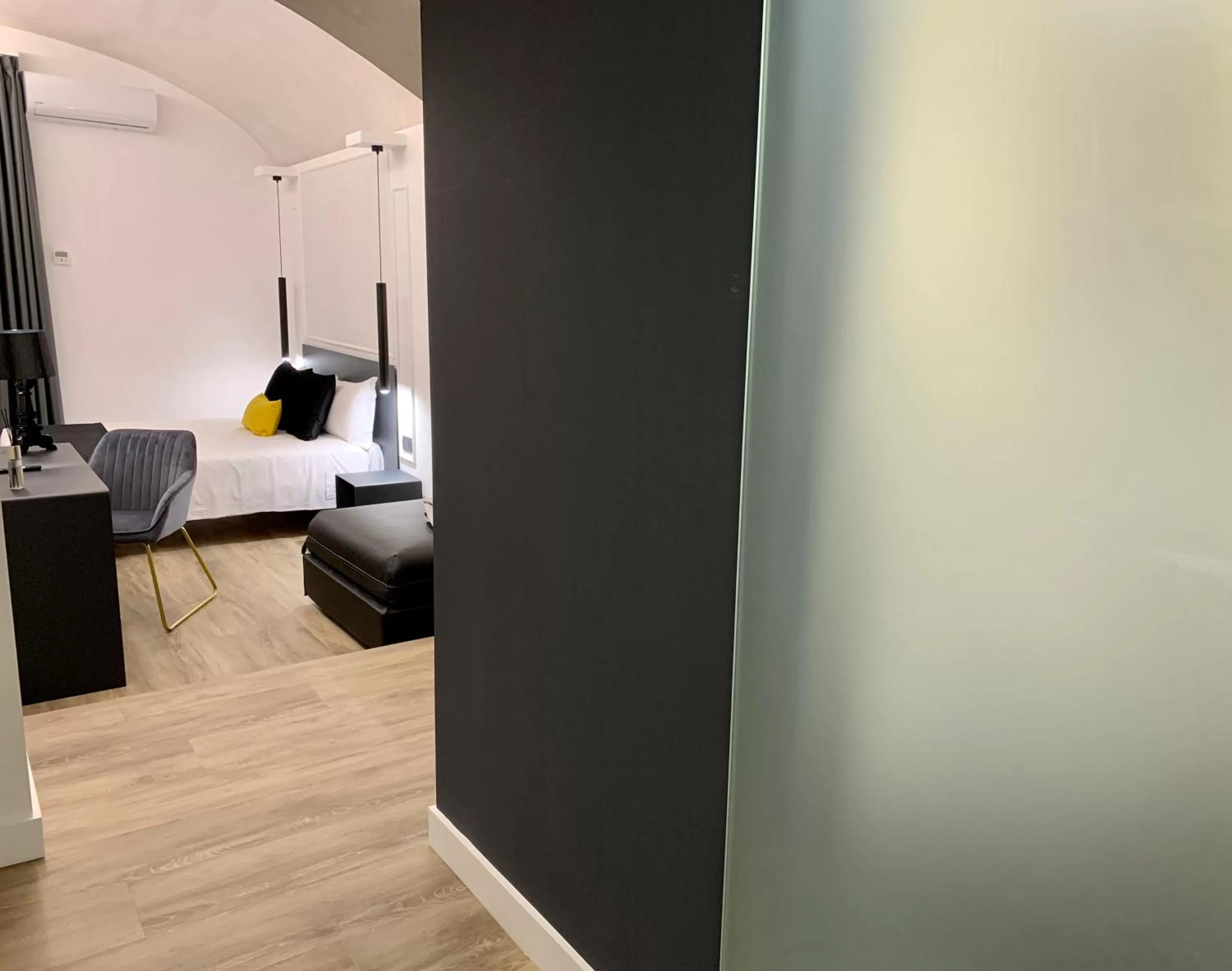 Bedroom in Toledo Boutique Rooms