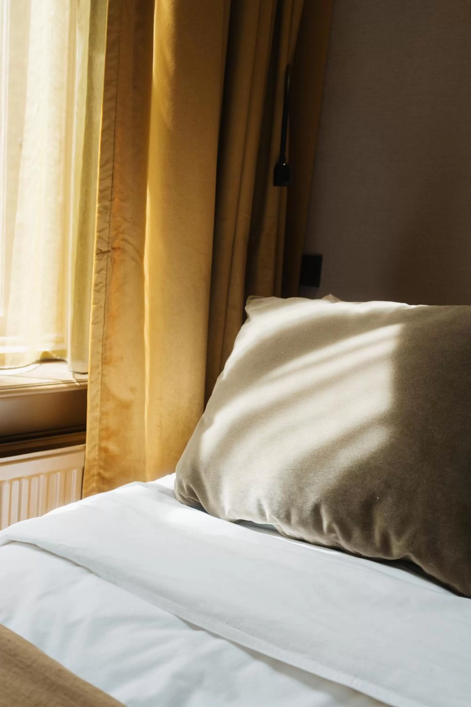 Bed in Hotel Staatsman