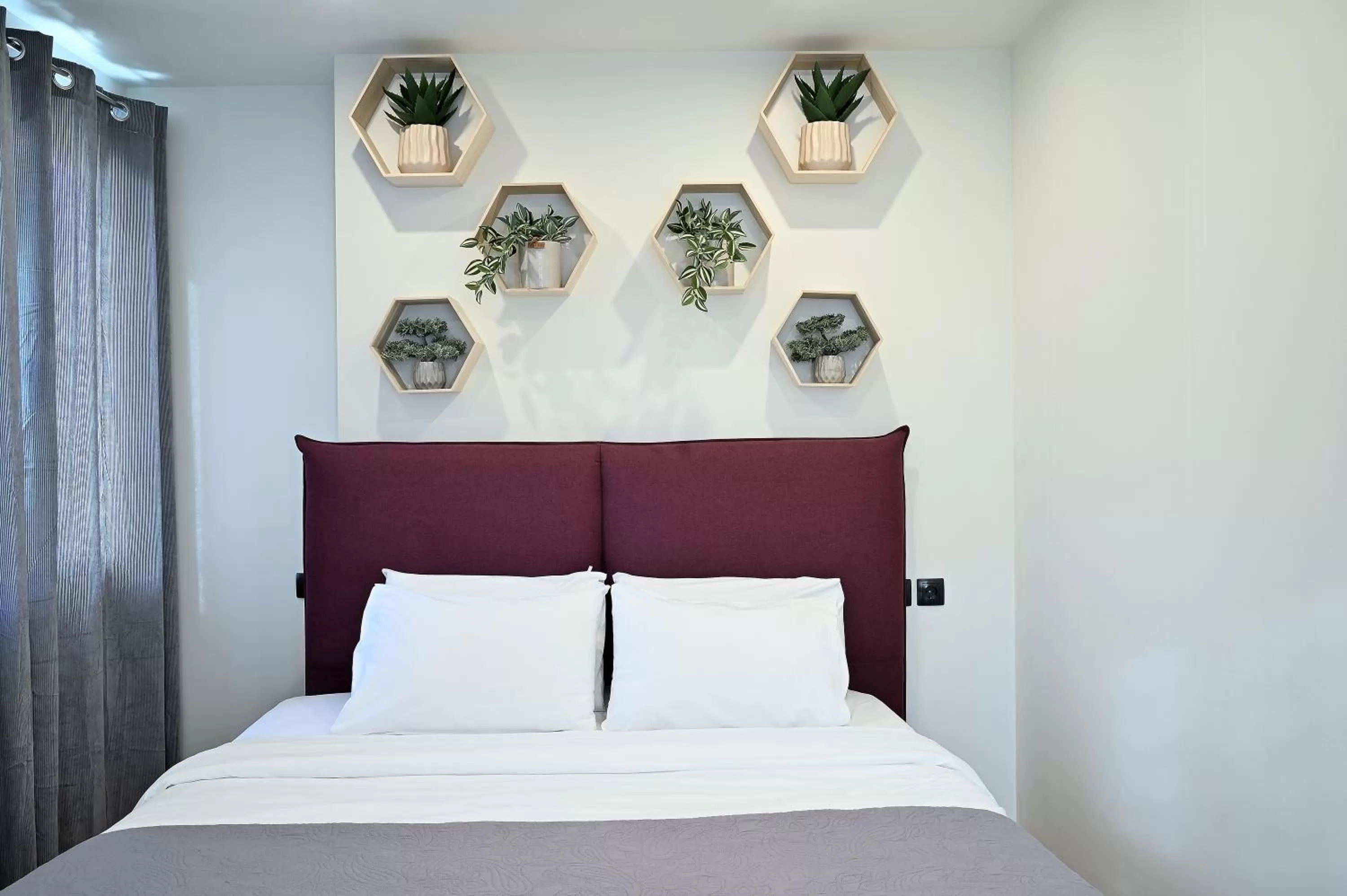 Bed in The Athens Version Luxury Suites