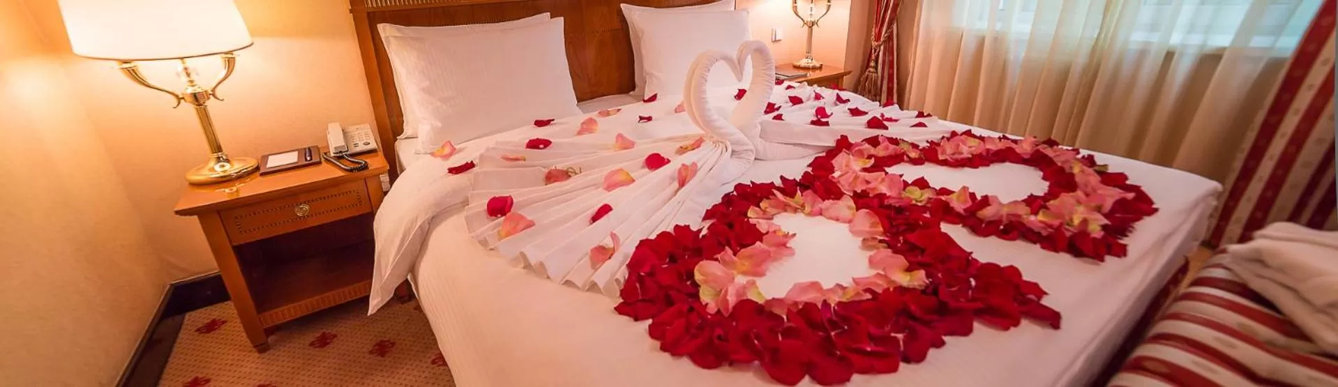 Bed in Grand Tien Shan Hotel