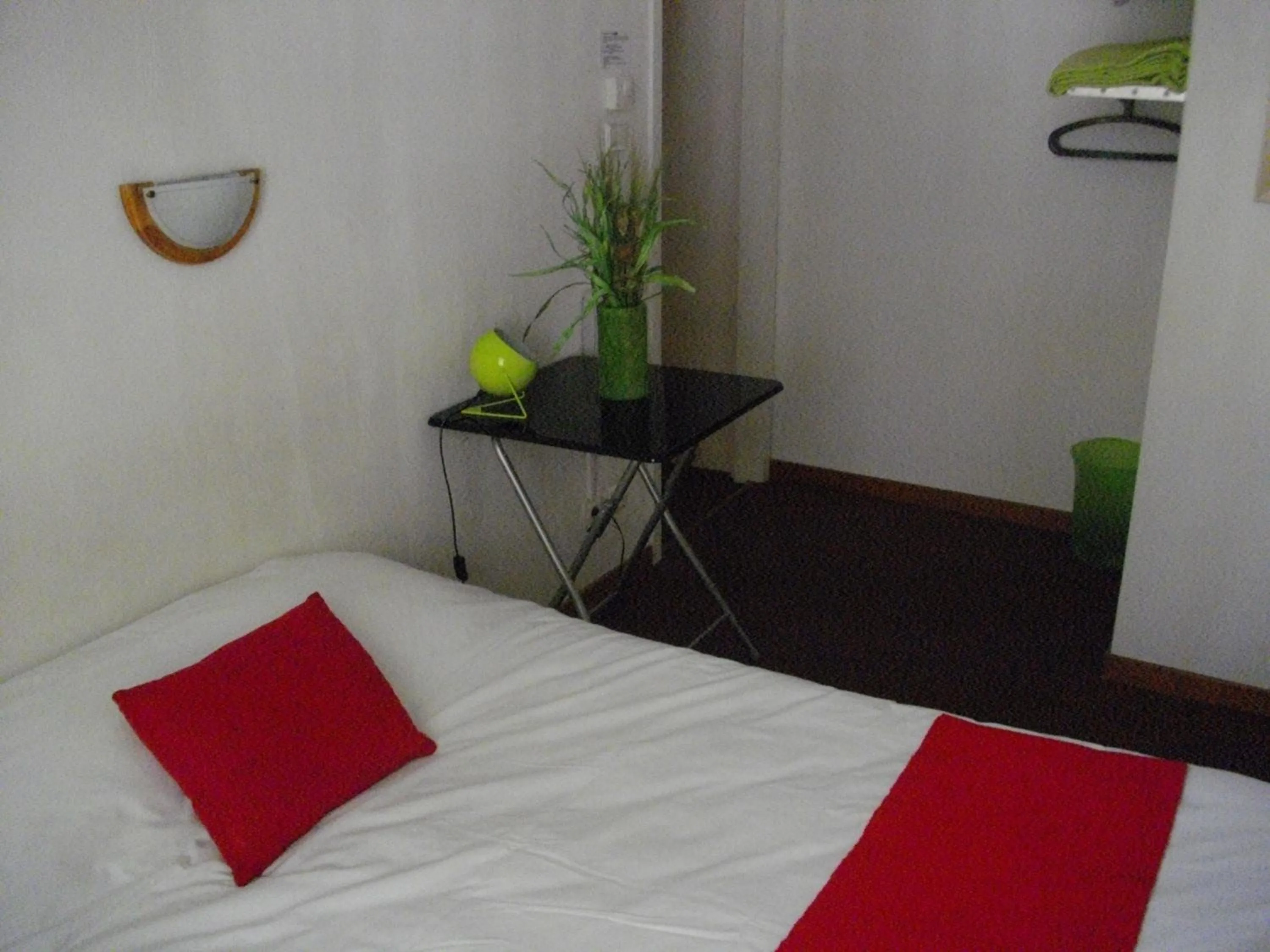 Photo of the whole room, Bed in Hôtel Central