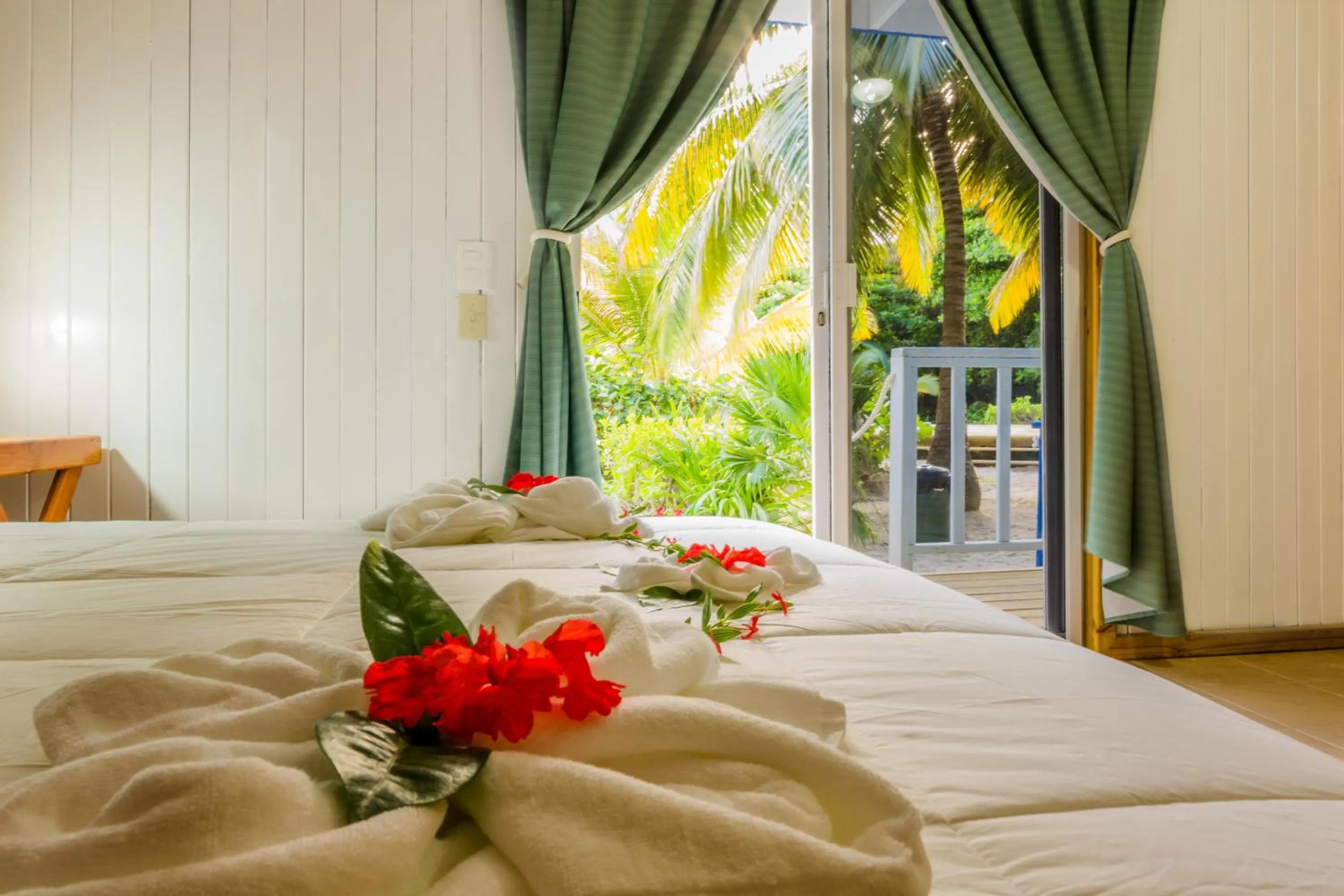 Bed in Caribbean Villas Hotel