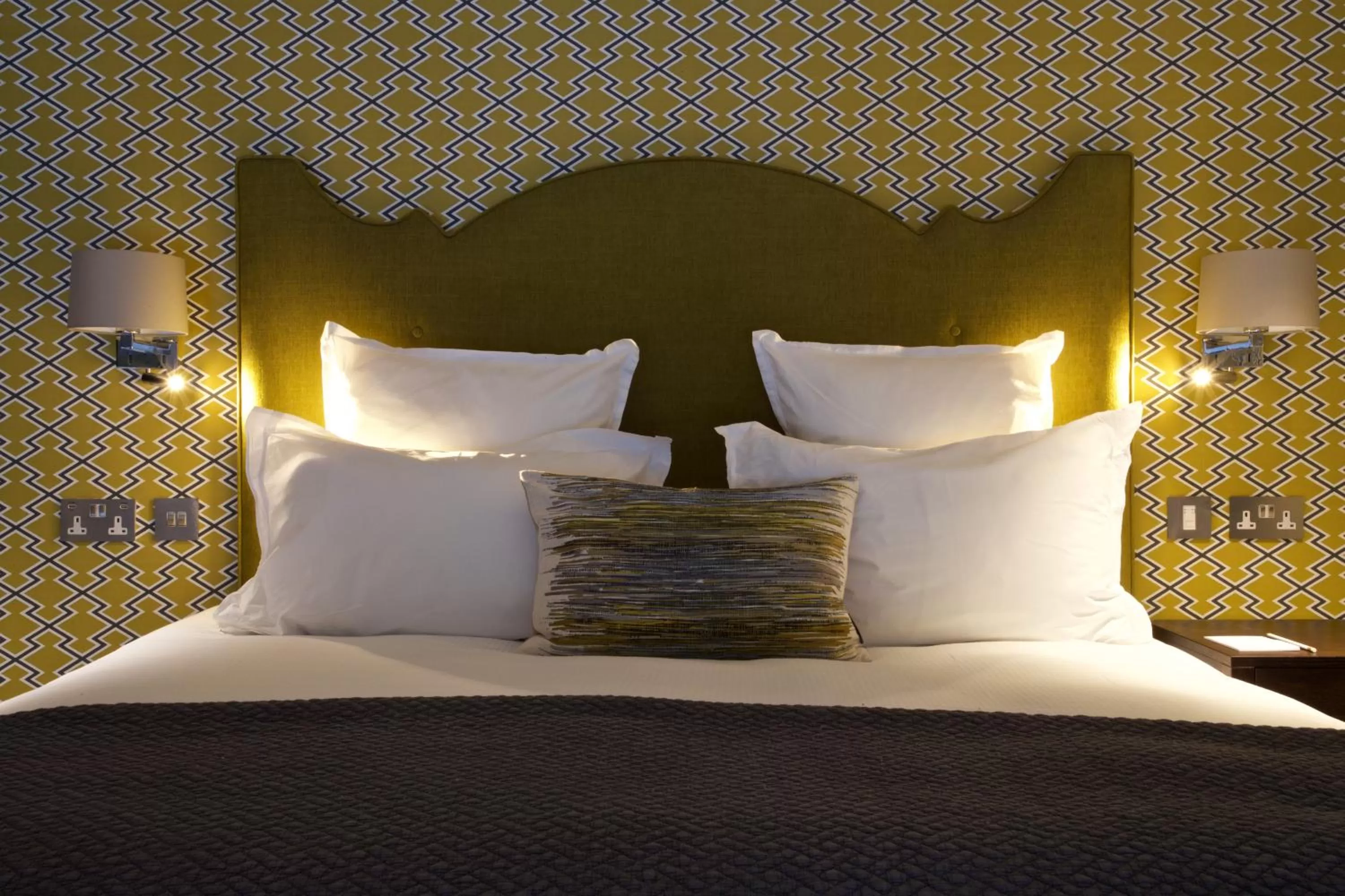 Bed in 54 Queen's Gate Hotel