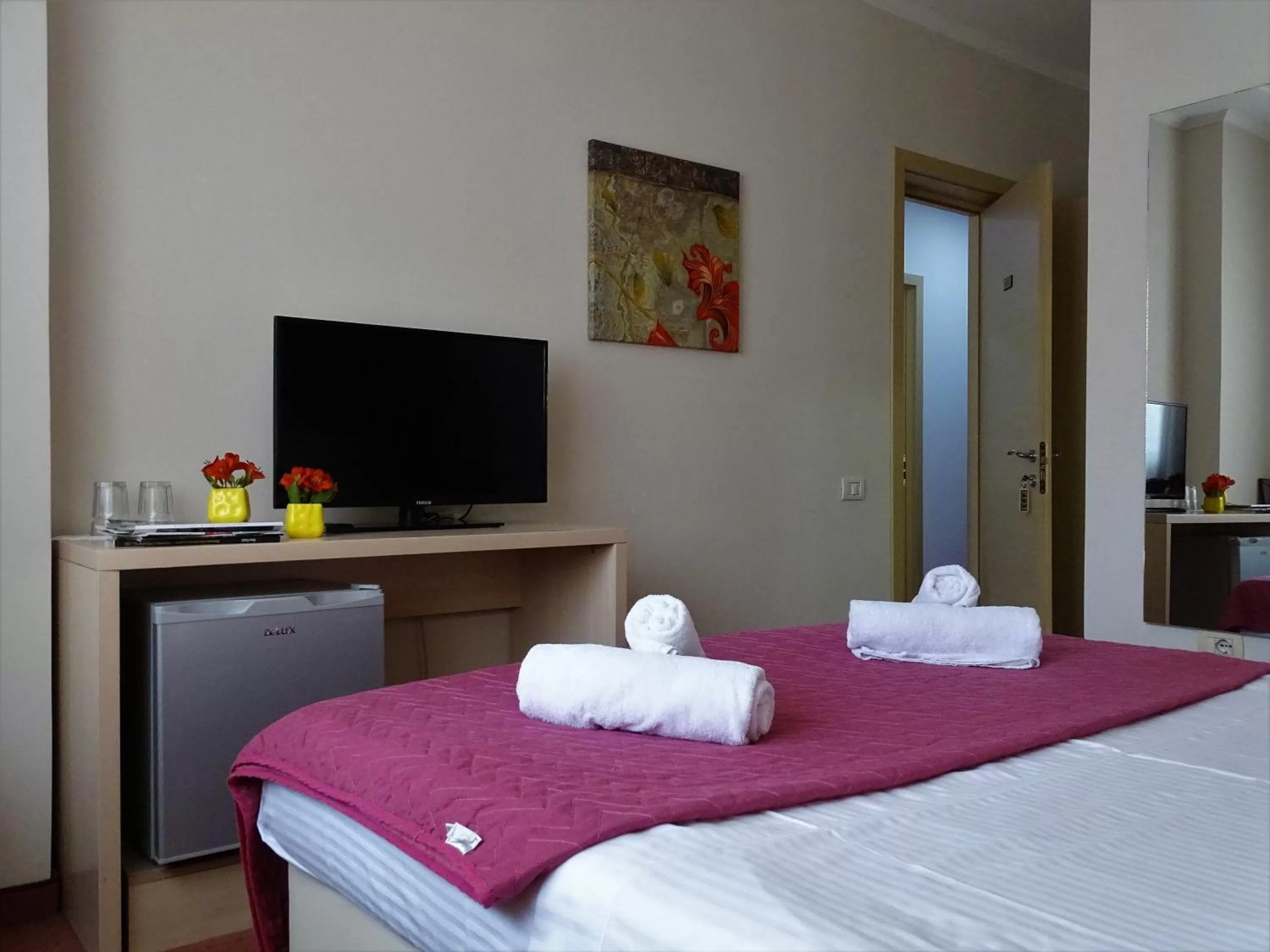 Bed in Signature Idea hotel