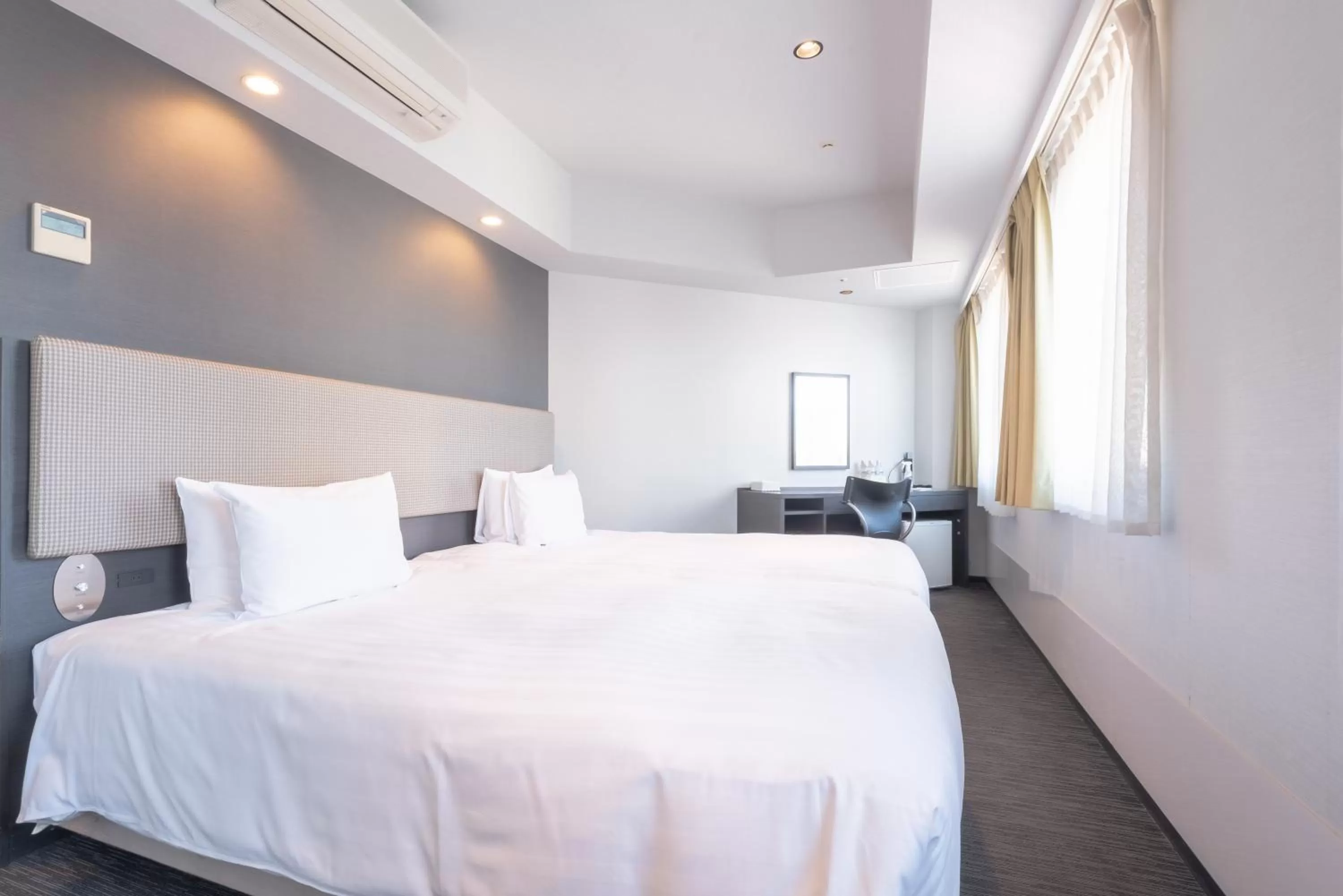 Bed in E Hotel Higashi Shinjuku