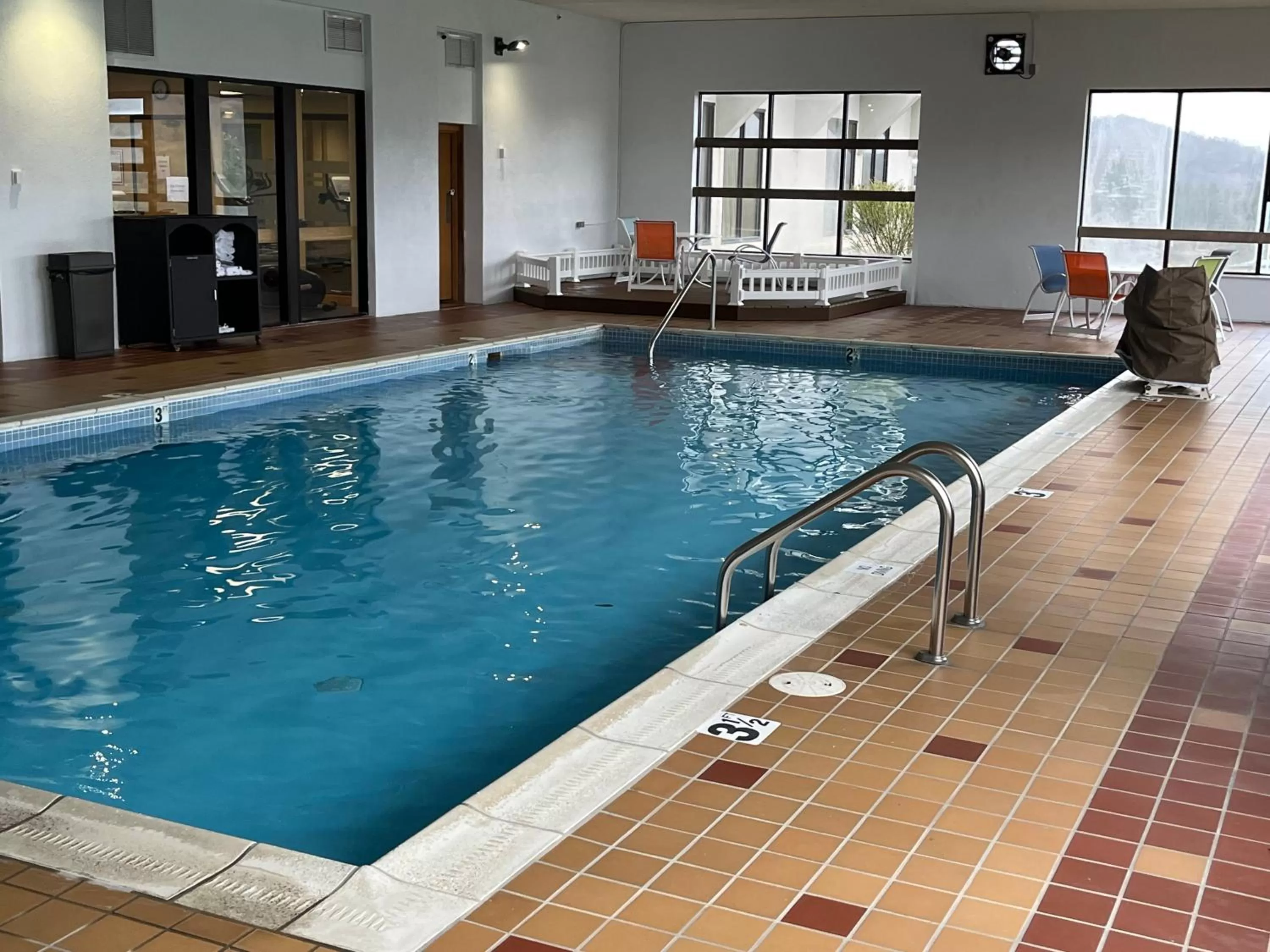 Pool view in Days Inn & Suites by Wyndham Sutton Flatwoods