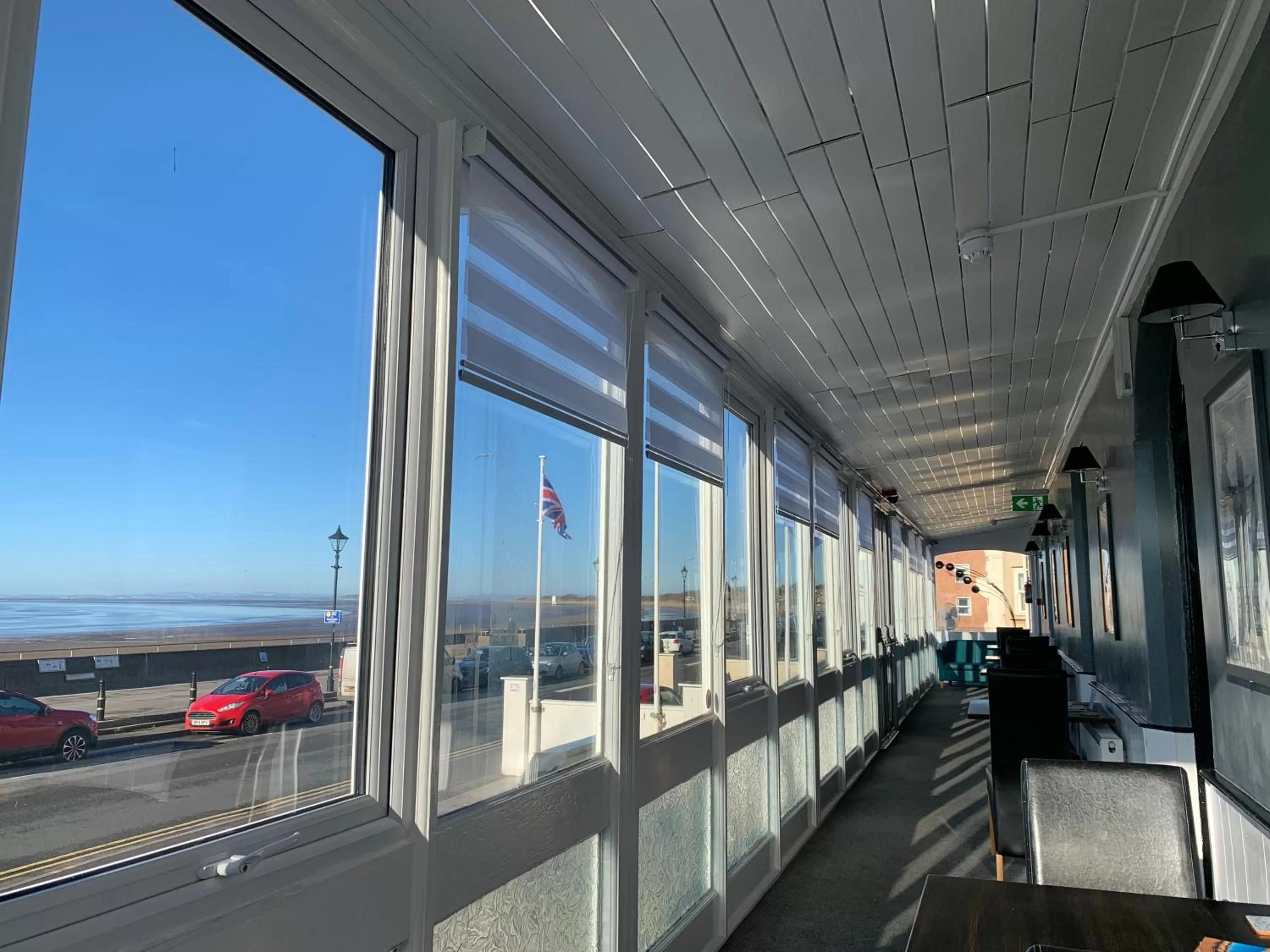 Communal lounge/ TV room in The Royal Clarence Hotel (on the Seafront)