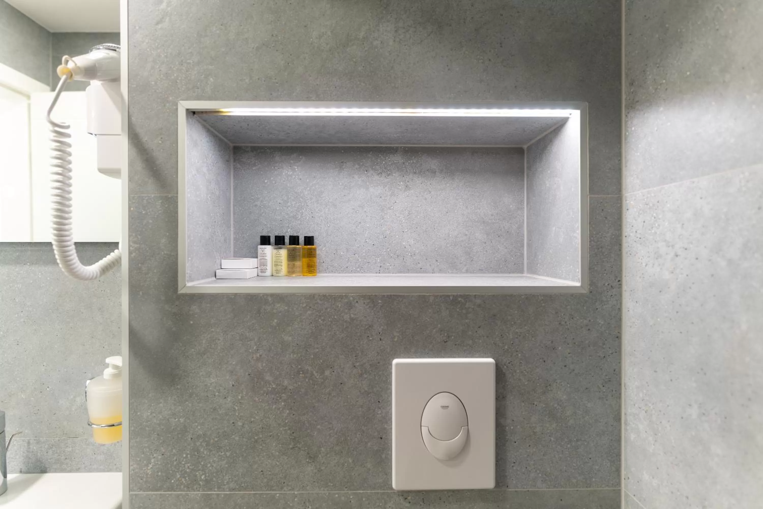 Bathroom in Ornament Hotel and Apartments