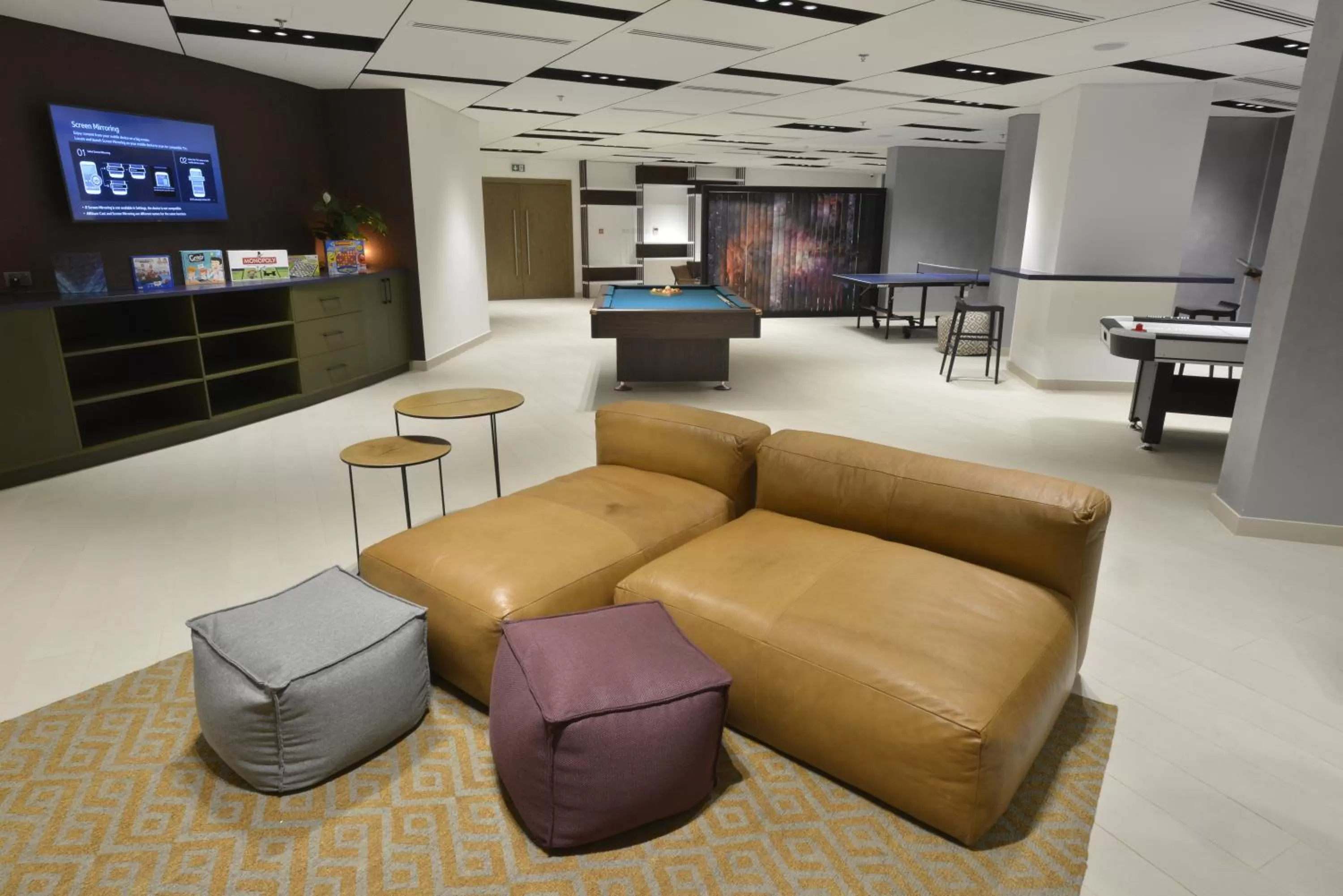 Communal lounge/ TV room in Swiss-Belresidences Juffair