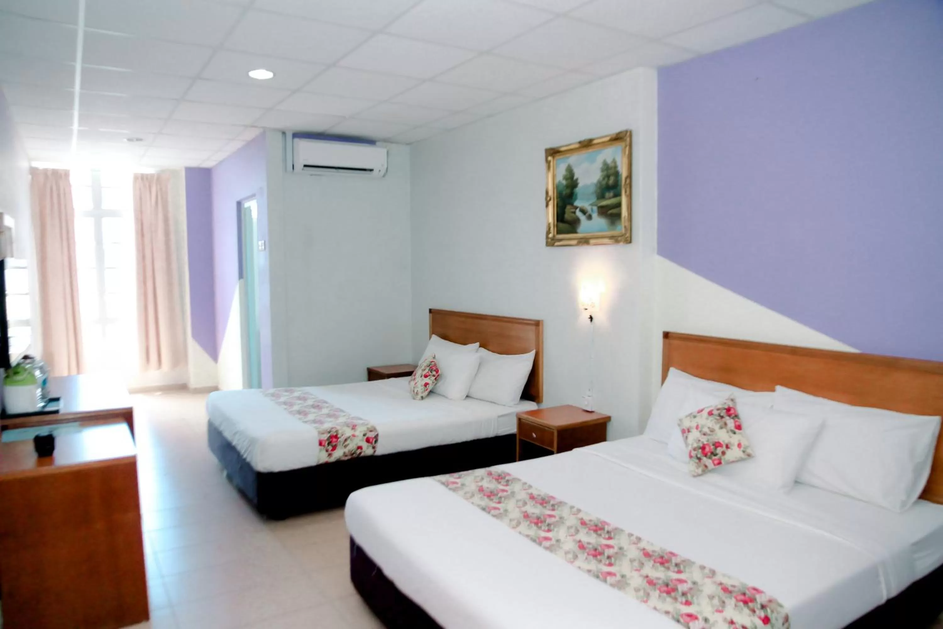 Bed in HOTEL D VIEW MERSING