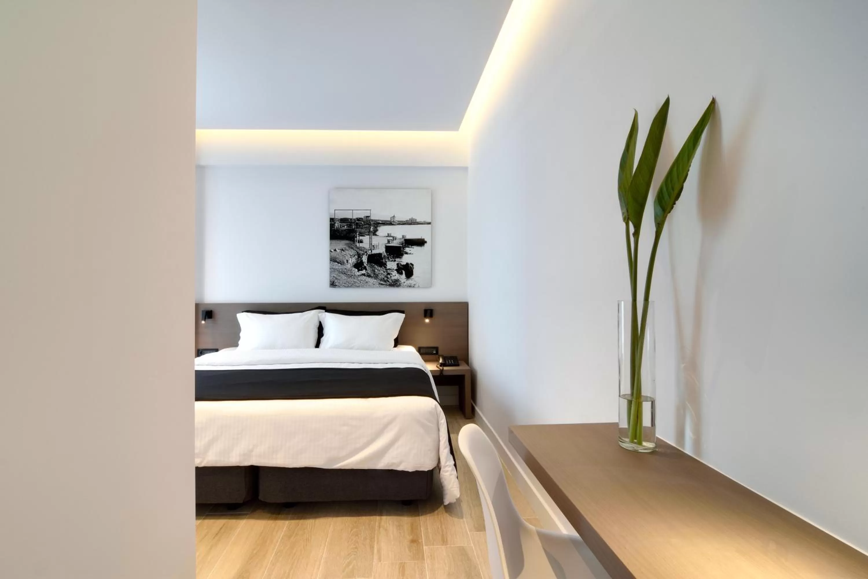 Bed in Poseidon Athens Hotel