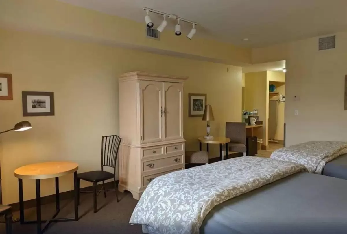 Bed in Rockwell Suites