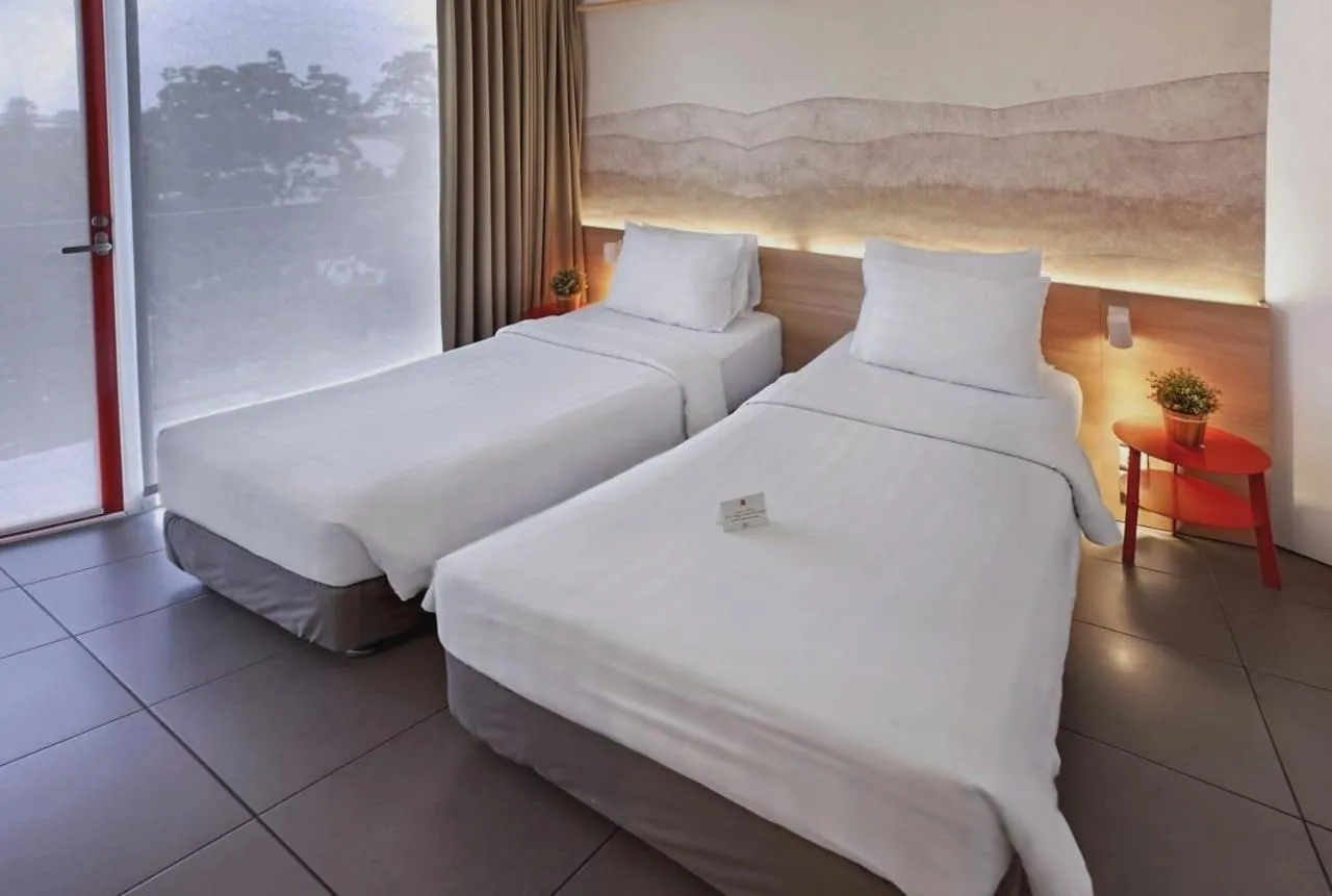 Bed in Malaka Hotel Bandung