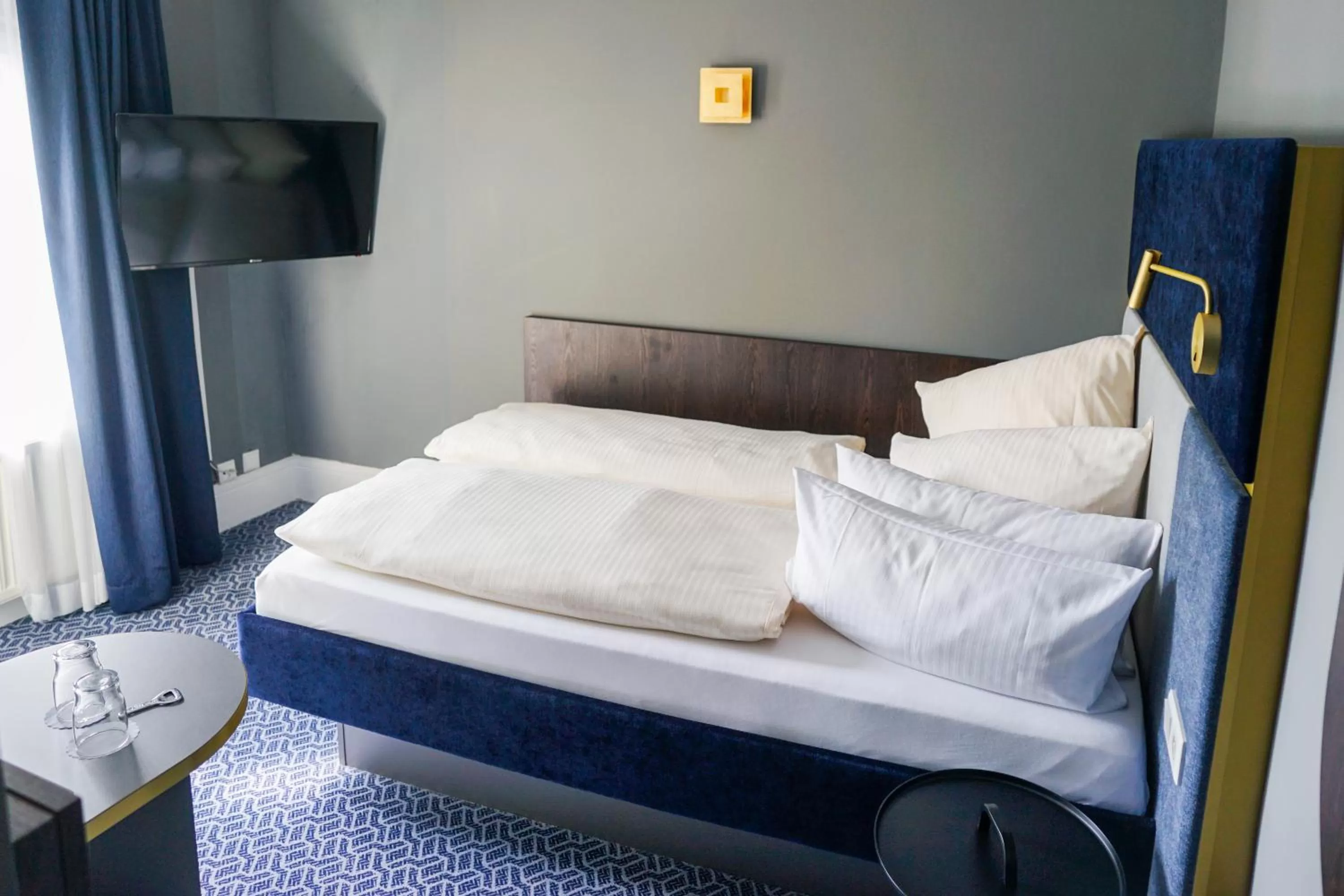 Bed in Hotel Am Schloss Biebrich