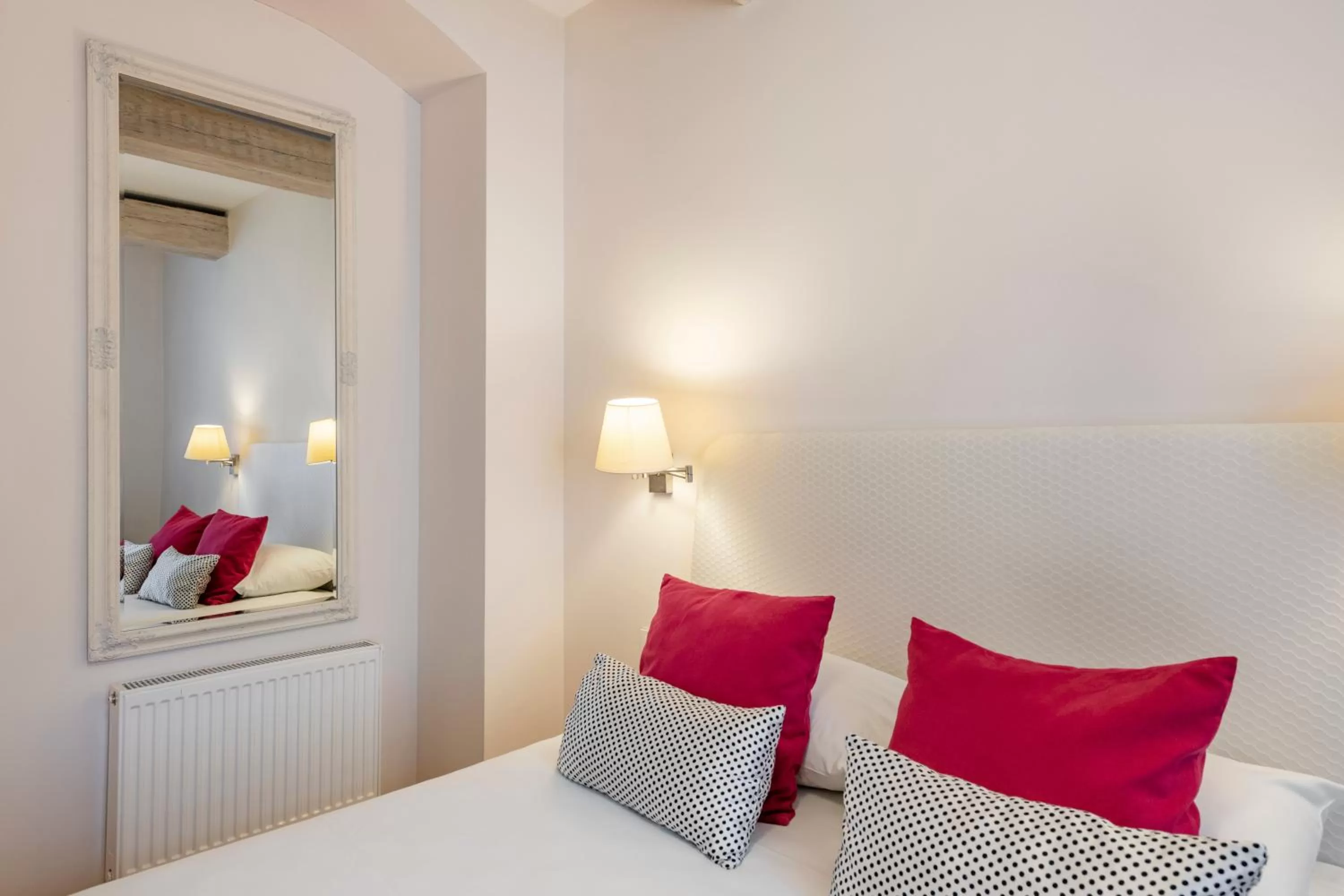 Bed in Vilnius Apartments